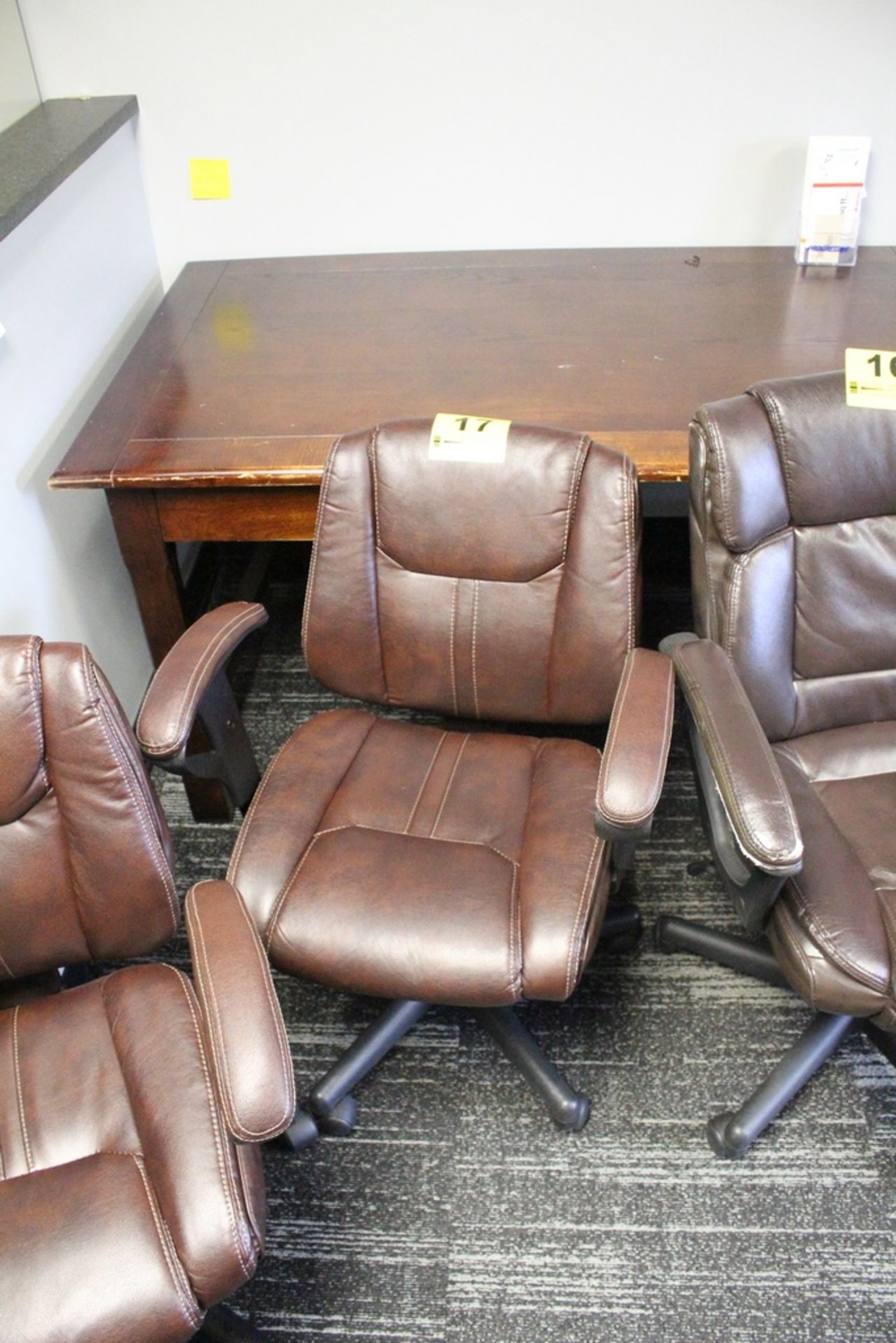 LEATHER ARM CHAIR WITH CASTERS