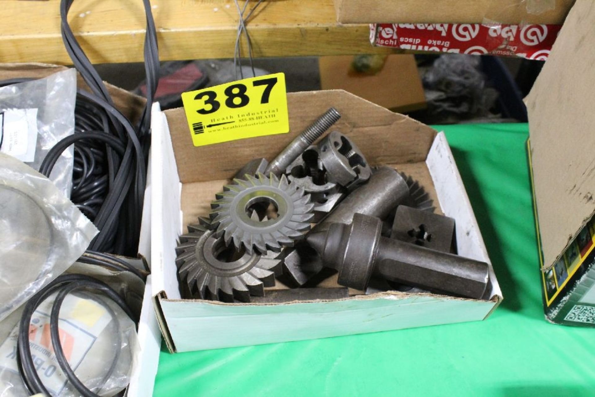 ASSORTED CUTTING WHEELS, CENTER, DIES, SLEEVE, ETC. IN BOX