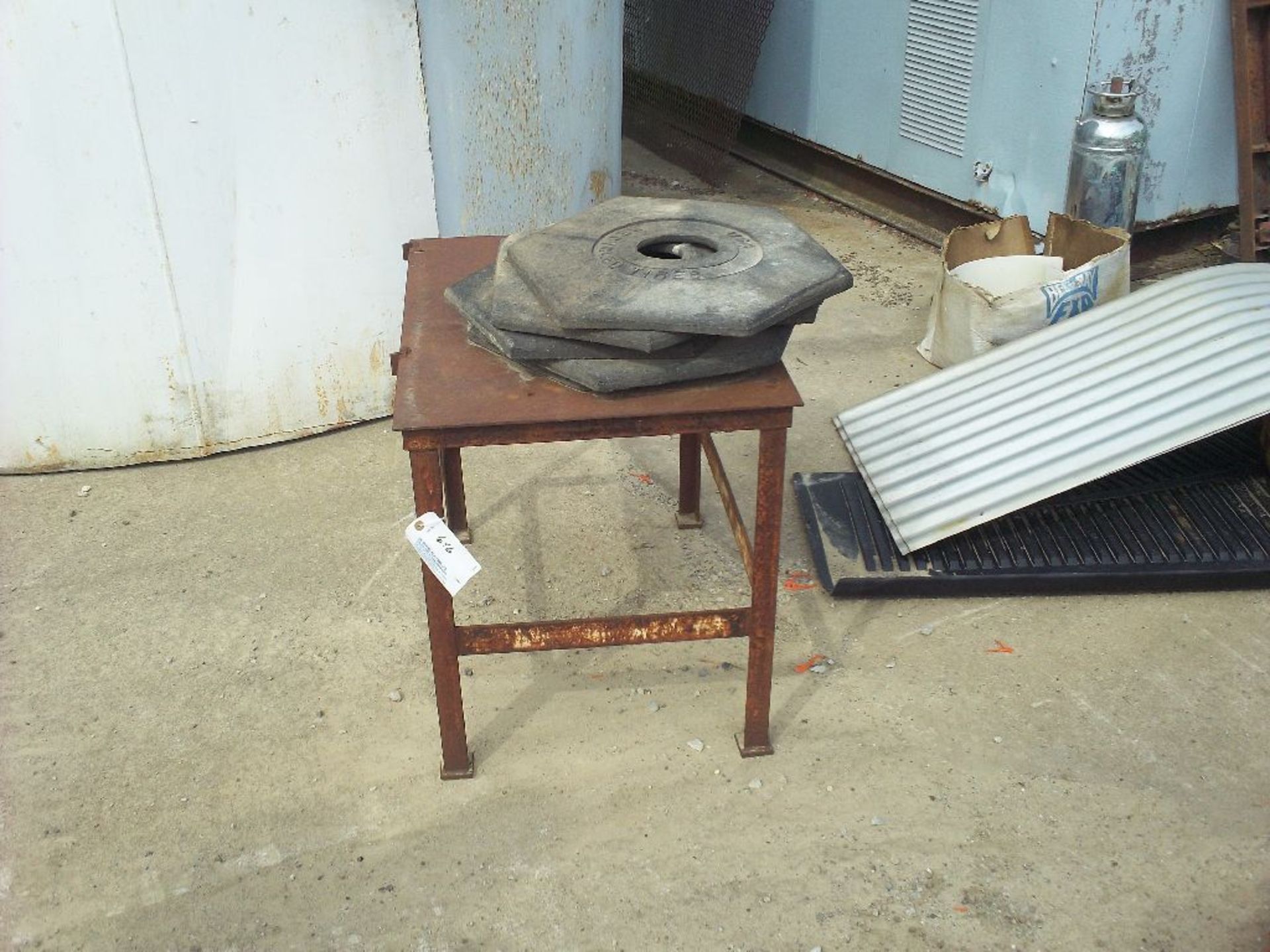 Metal table, safety cone weights.