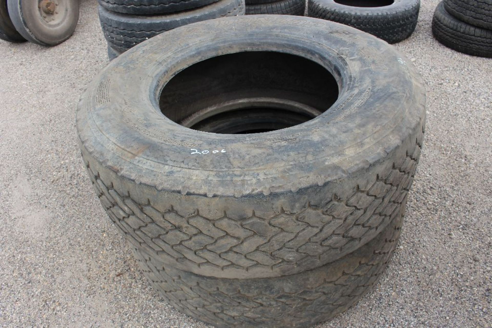 (2) Large Dunlop tires, 385/65 R 22.5.