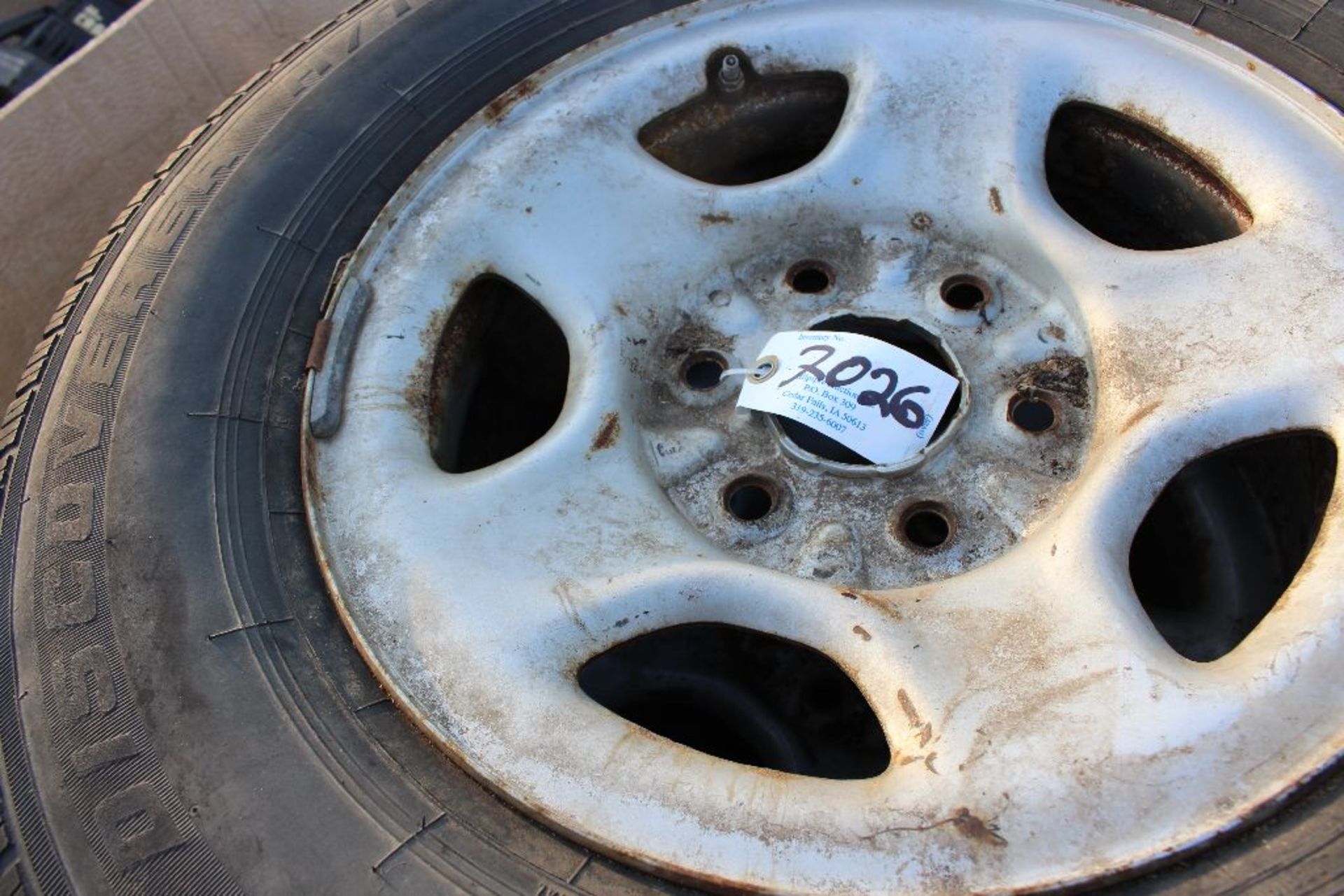 (4) Chevy 6 Lug rims/tires, chrome hub caps.