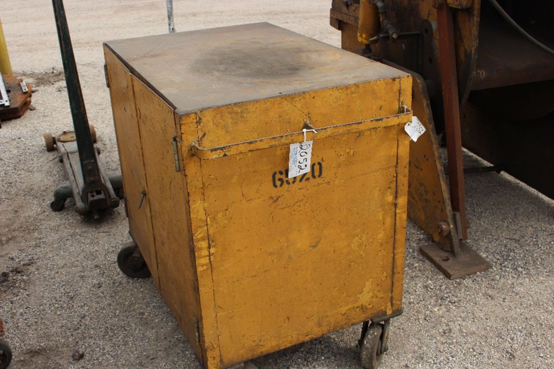 Rolling metal cabinet.