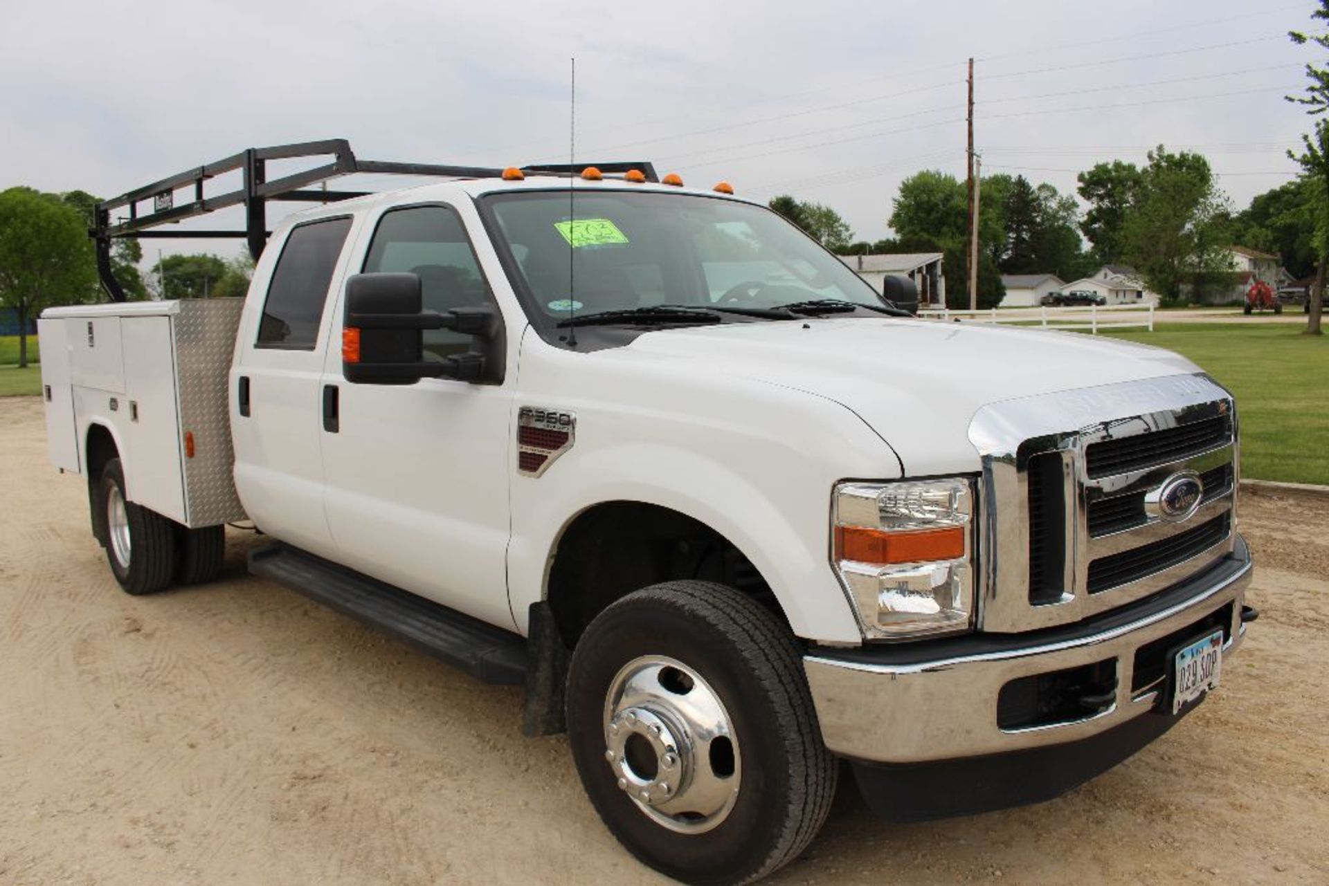 2010 Ford F350 truck, vin 1FDWW3HR9AEA77169, miles on odo 85,503, w/utility box.