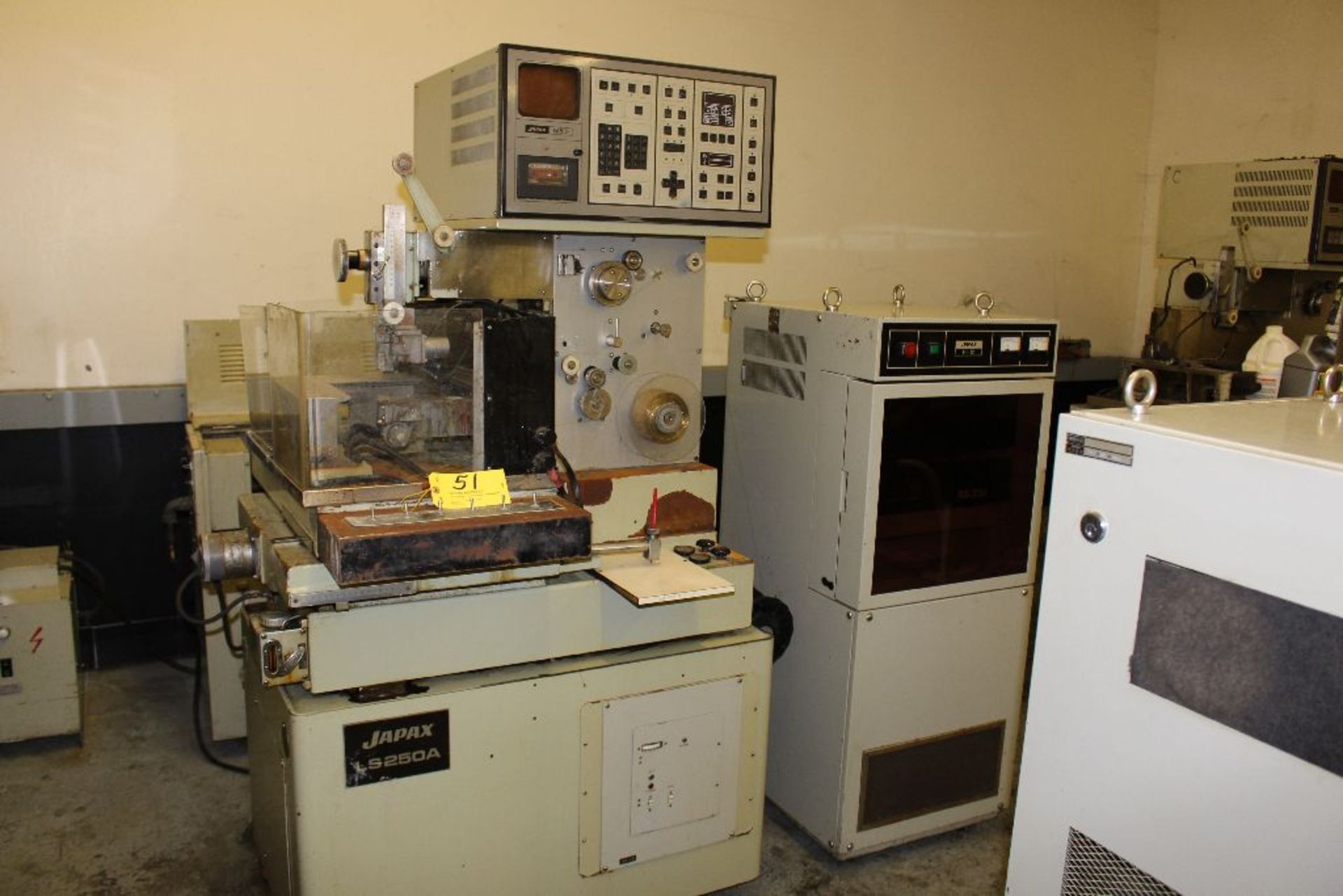 Japax wire EDM machine, model LS 250A, 1982 model, s/n 104-21-583; power supply unit VH-01;