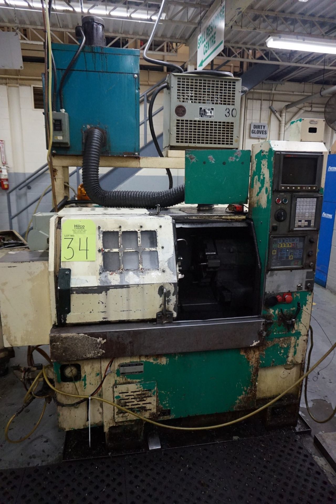 Takamatsu Model X10 CNC Lathe 200/220V c/w Chip Conveyor, Transformer