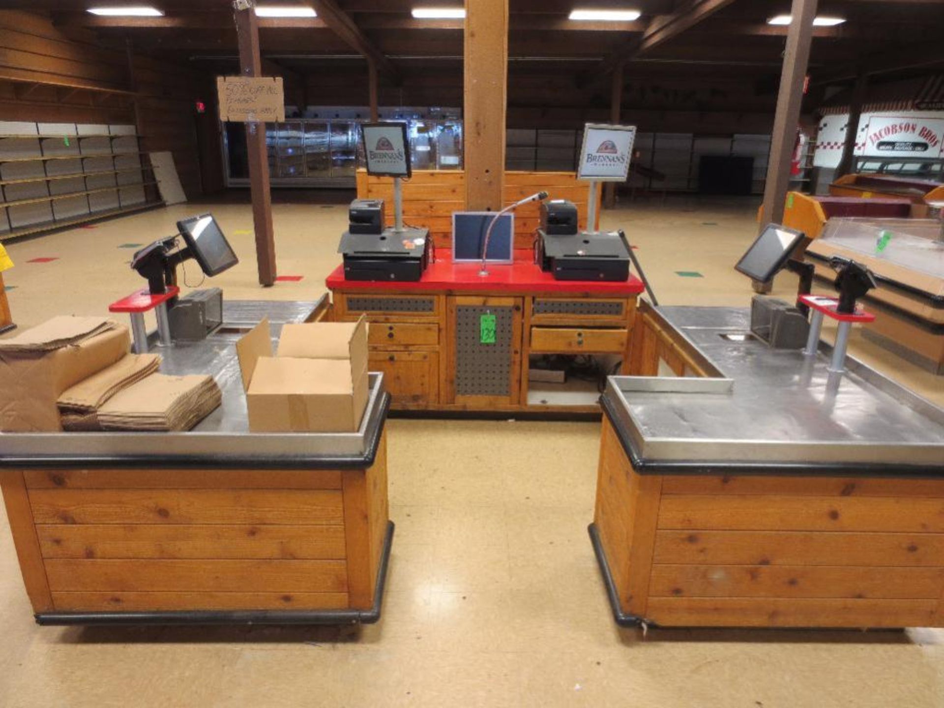 Large Island Point of Sale Checkout with Registers, Monitors, Scanners, Card Readers and Display