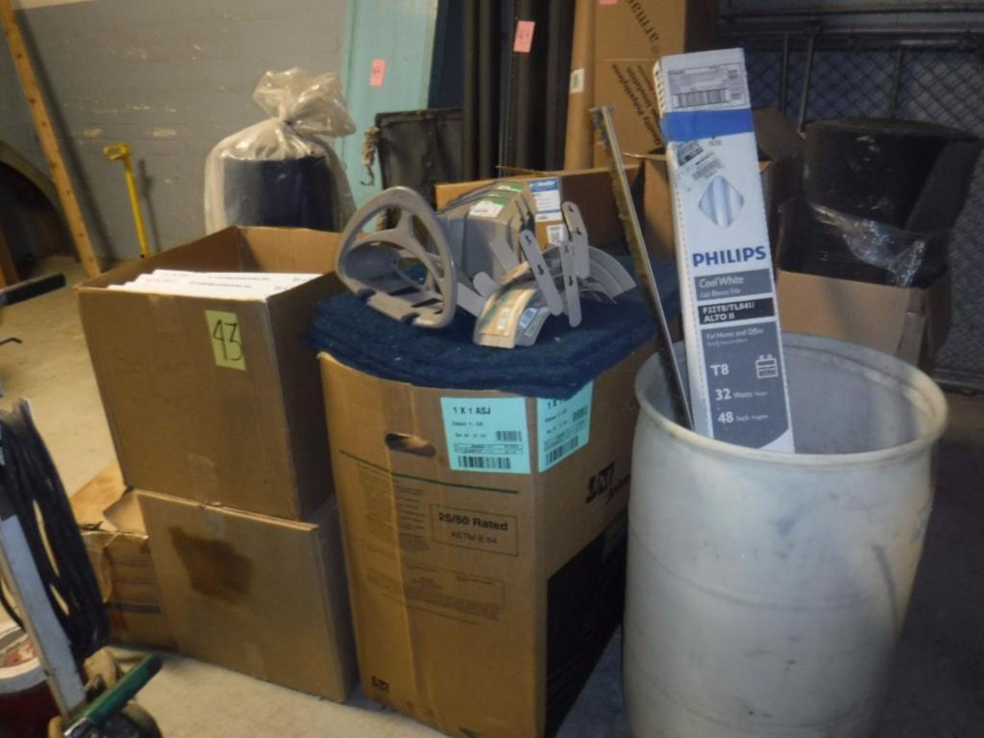 Boxes of Filters, Foam, Pipe Insulation, Hose Hangers, Hose, Blue Metal Shelf