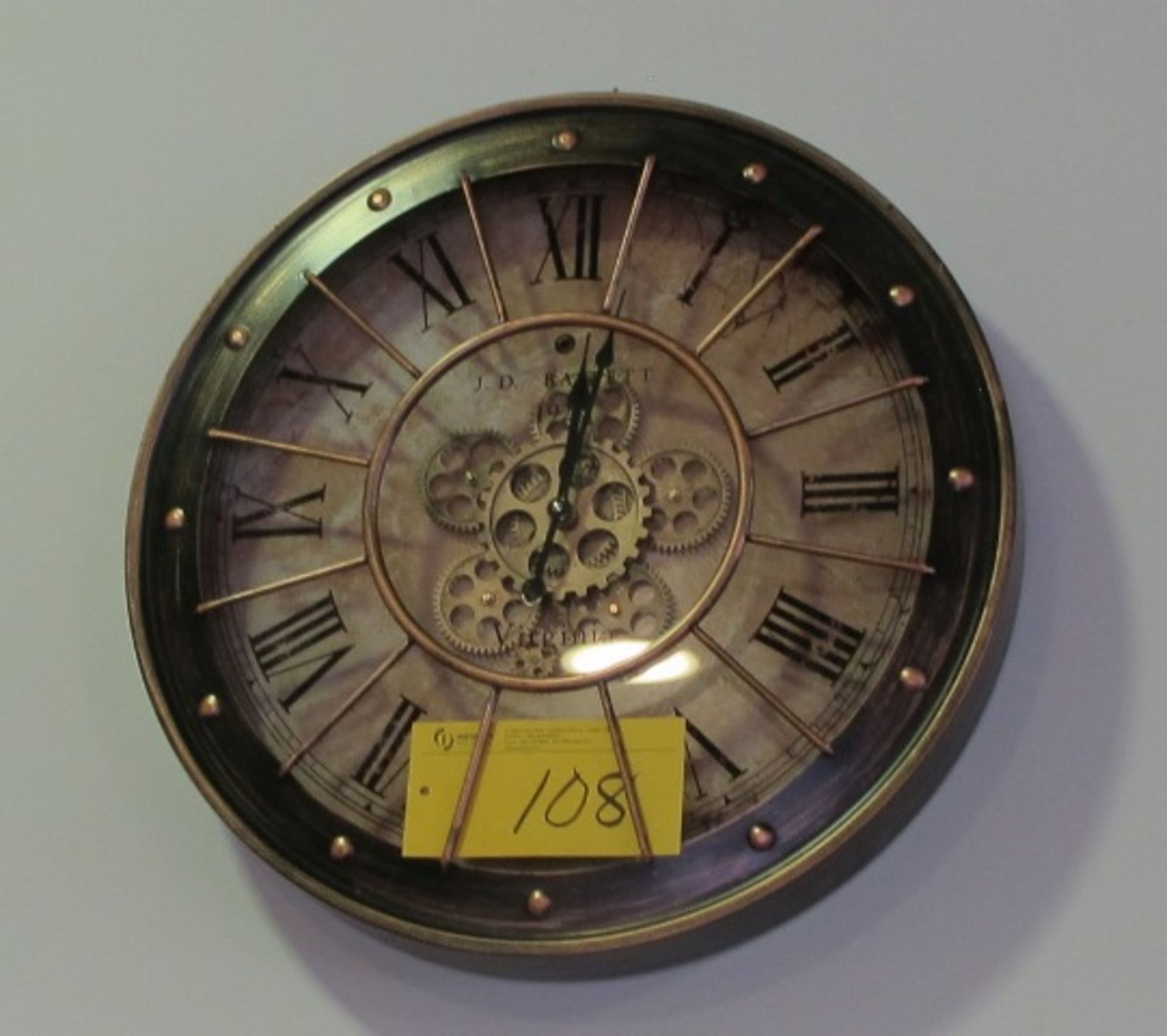JD BASSETT WALL CLOCK, 24"DIA