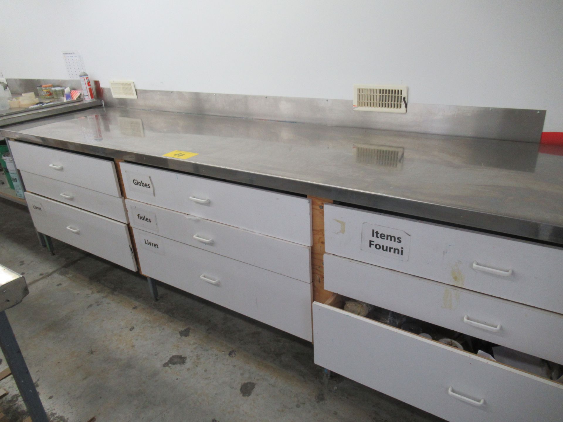 S.S. TOP BENCH C/W (9) DRAWERS C/W CONTENTS