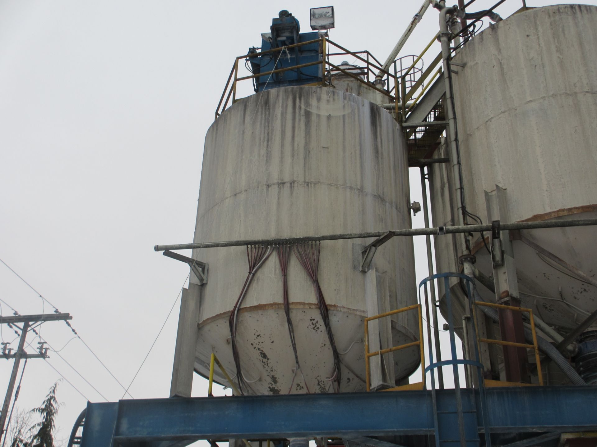 SILO #32 - STEEL TRUCK LOAD OUT W/ LOAD , CELLS APPROX. 10 FOOT DIA. X 20 FOOT HIGH