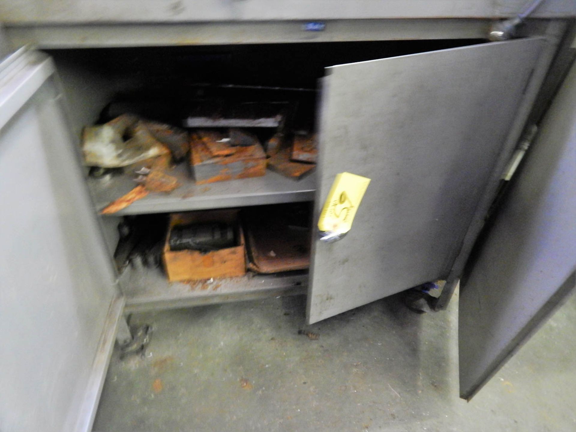 2 DOOR STEEL CABINET (NO TOP CONTENTS)