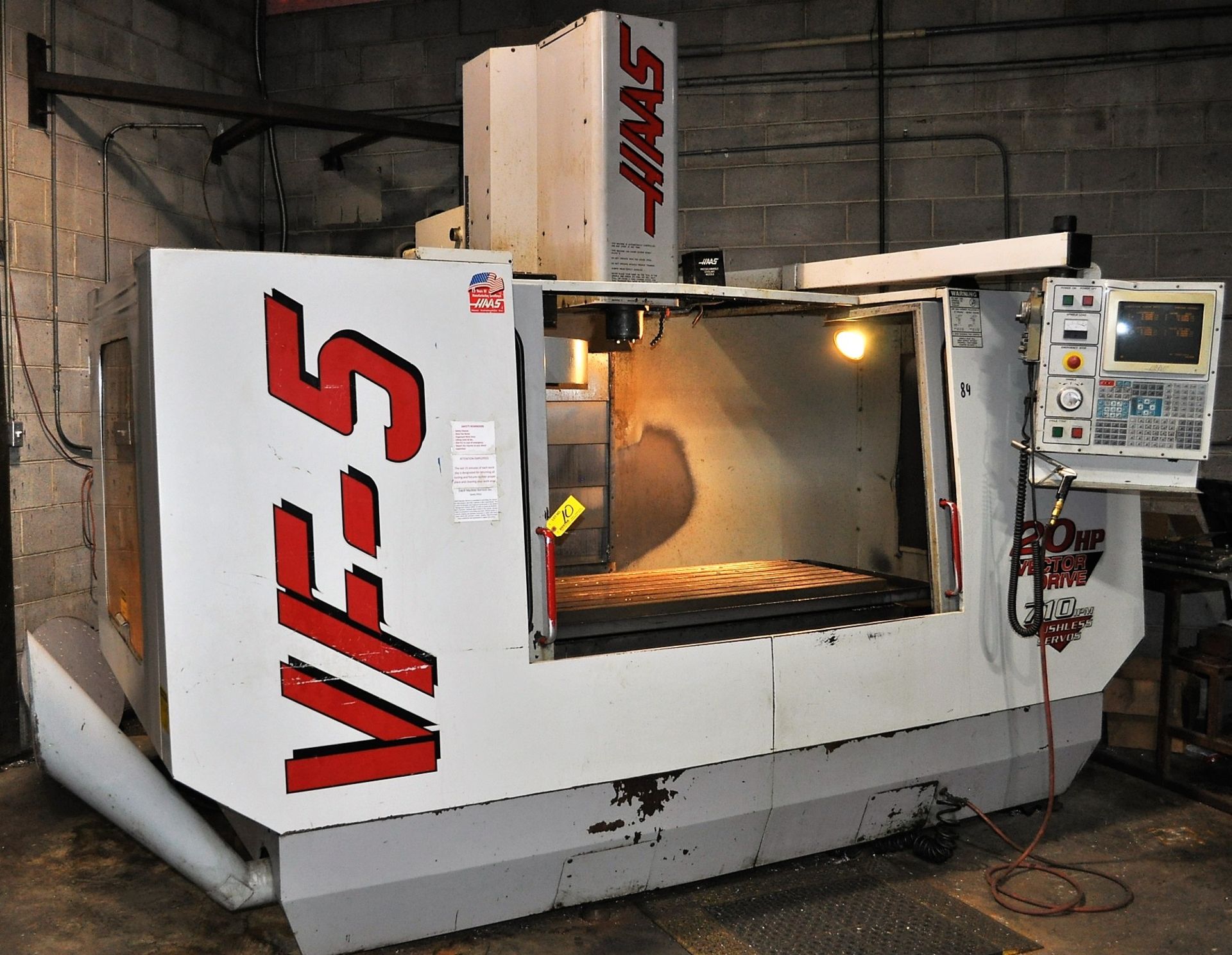 HAAS MDL. VF5 CNC VERTICAL MILL, WITH 62'' X 23'' TABLE, 4'' HIGH SLOTTED SUB TABLE, TRAVELS: X-
