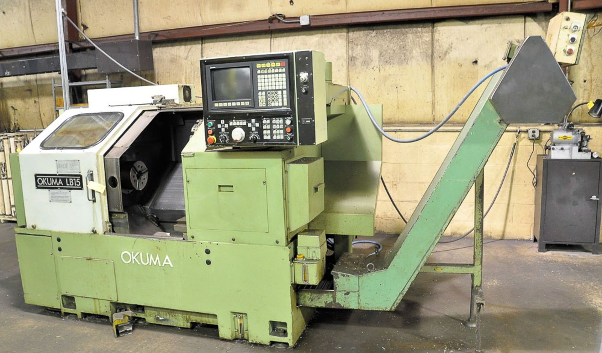 OKUMA MDL. LB-15 2-AXIS CNC TURNING CENTER, WITH OKUMA OSP-5020L CNC CONTROLS, COLLET HEAD, 20HP,