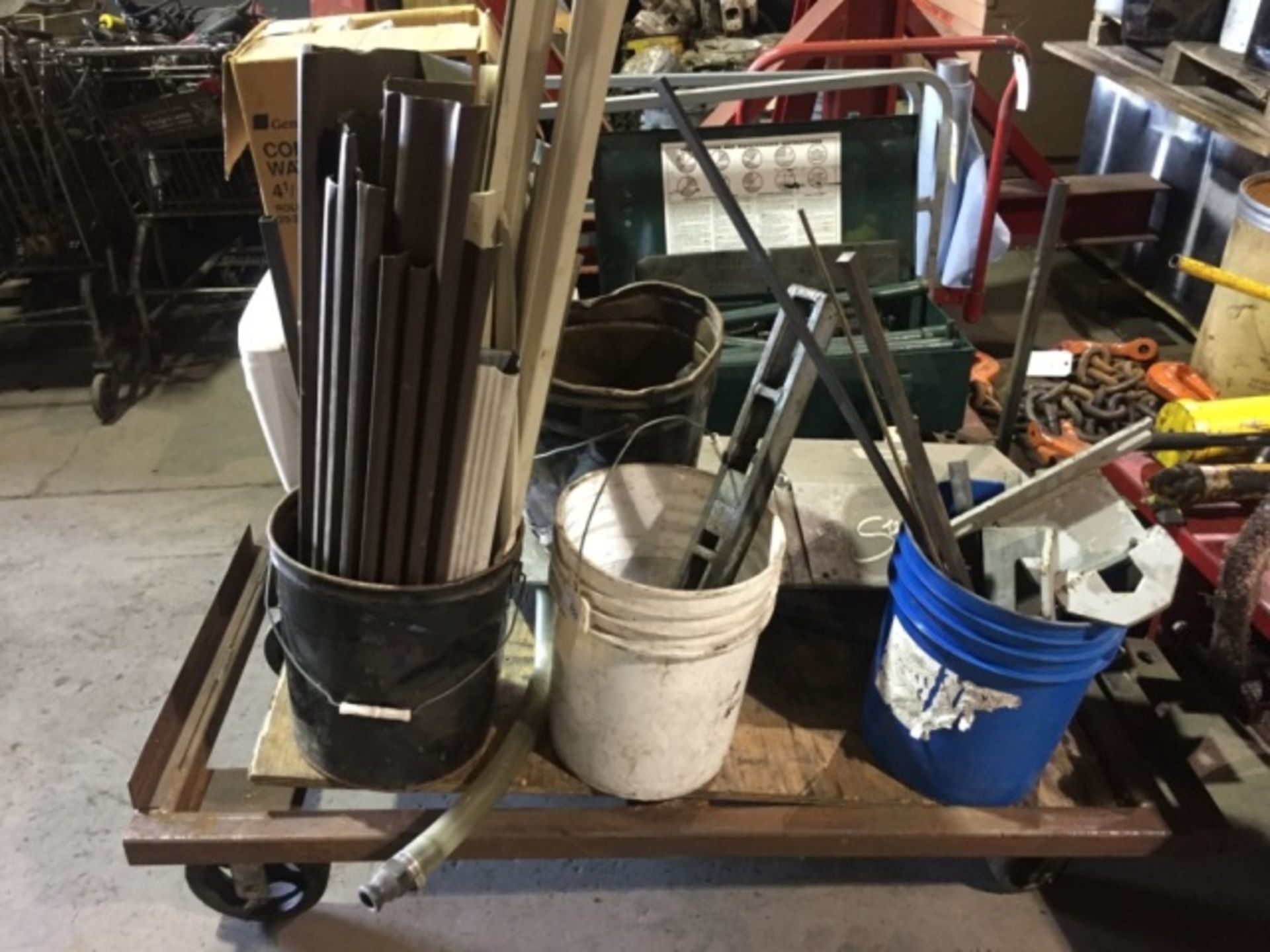Metal rolling cart with various contents