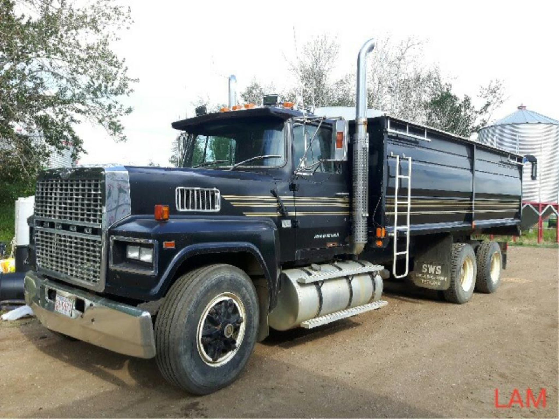 1987 LTL 9000 Ford T/A Grain Truck VIN 1FDYA90W0HVA51713 400 Cummins Eng, 13 spd tr, Spring Susp,