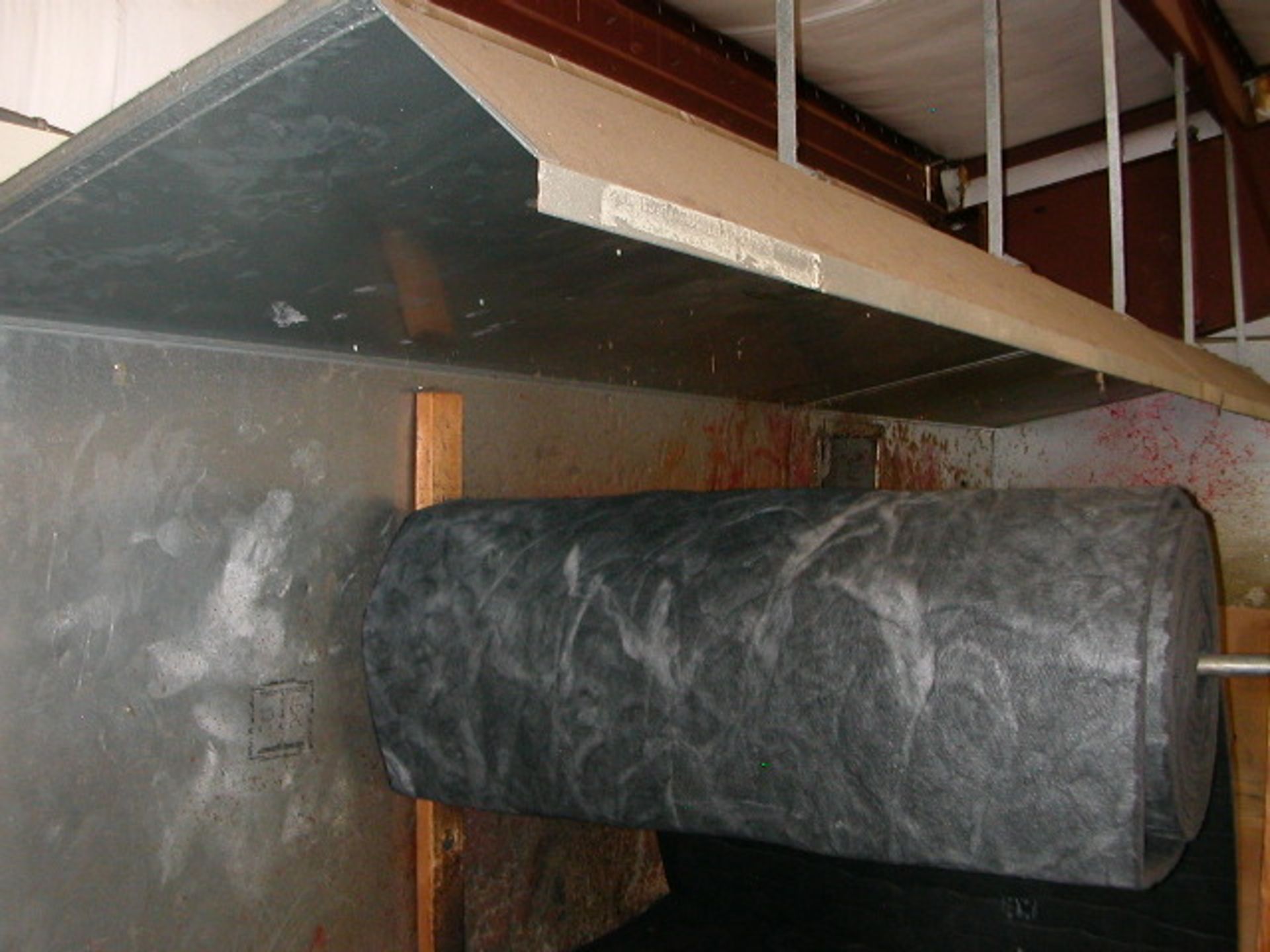 Vent Hood, Roll of Insulation, & Insulation Spray Installation Work Table/Area