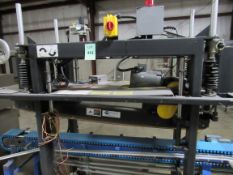 Lid Closer by Packaging Automation Corp. Packing System with Span-Tech Motorized Conveyor on