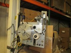 LSI Label Applicator with build in vacuum pump Model 96T0 Serial No. 1023162 designed to apply ore-