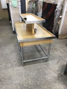 Brown table with metal legs-- Width 5 FT length 32 inches Height 30 inches with Riser (45 inches