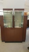 Two Display Cabinets wrapped around column. May take or leave Trim Rigging Cost: $65
