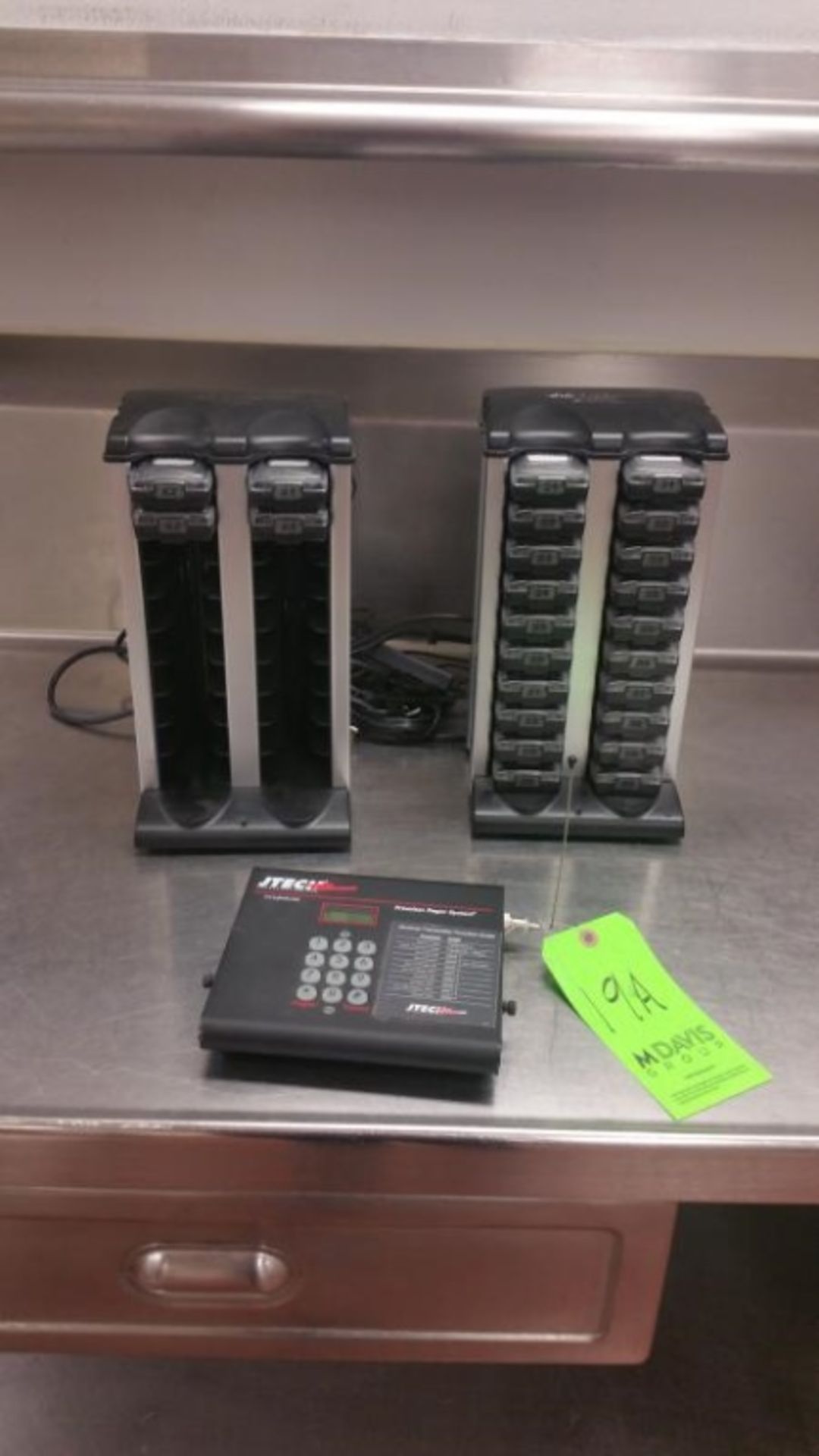 Jtech Paging System including 2 Charging Towers and 24 Pagers Rigging Cost: $15 Will be in box