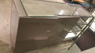 72” x 24” x 40” Chrome and Glass Display Cabinet with (2) Glass Shelves, and Lighting New in 2016