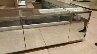 54" x 24” x 40” Mirrored Front Single Level Display Cabinet, Lighting and (6) Pull out Drawers on