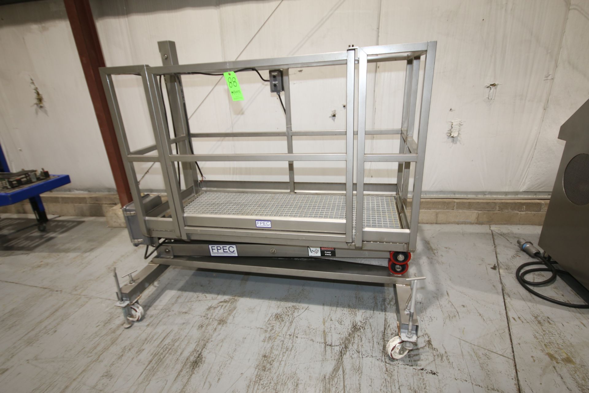 FPEC S/S Hydraulic Manlift Platform, S/N 1975 with Aprox. 6 ft. L x 32" W Platform, Plastic Grating,