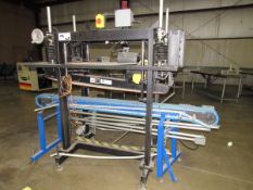 Lid Closer by Packaging Automation Corp. Packing System --Span-Tech Motorized Conveyor on bottom and