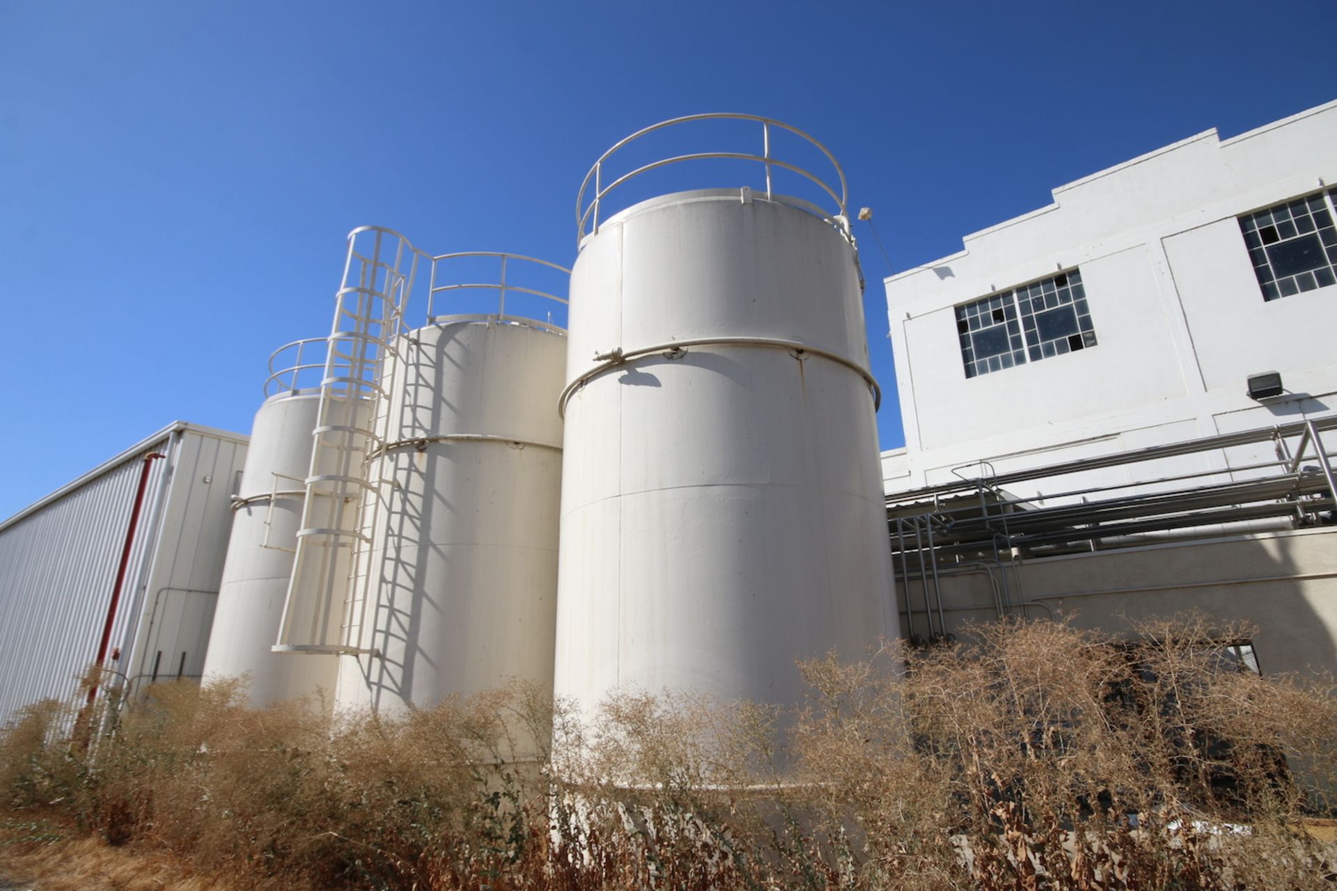 BULK BID: LOTS 1-11. INCLUDES (3) MUELLER 15,00 GALLON SILOS, (4) CENTRIFUGAL PUMPS, CHA