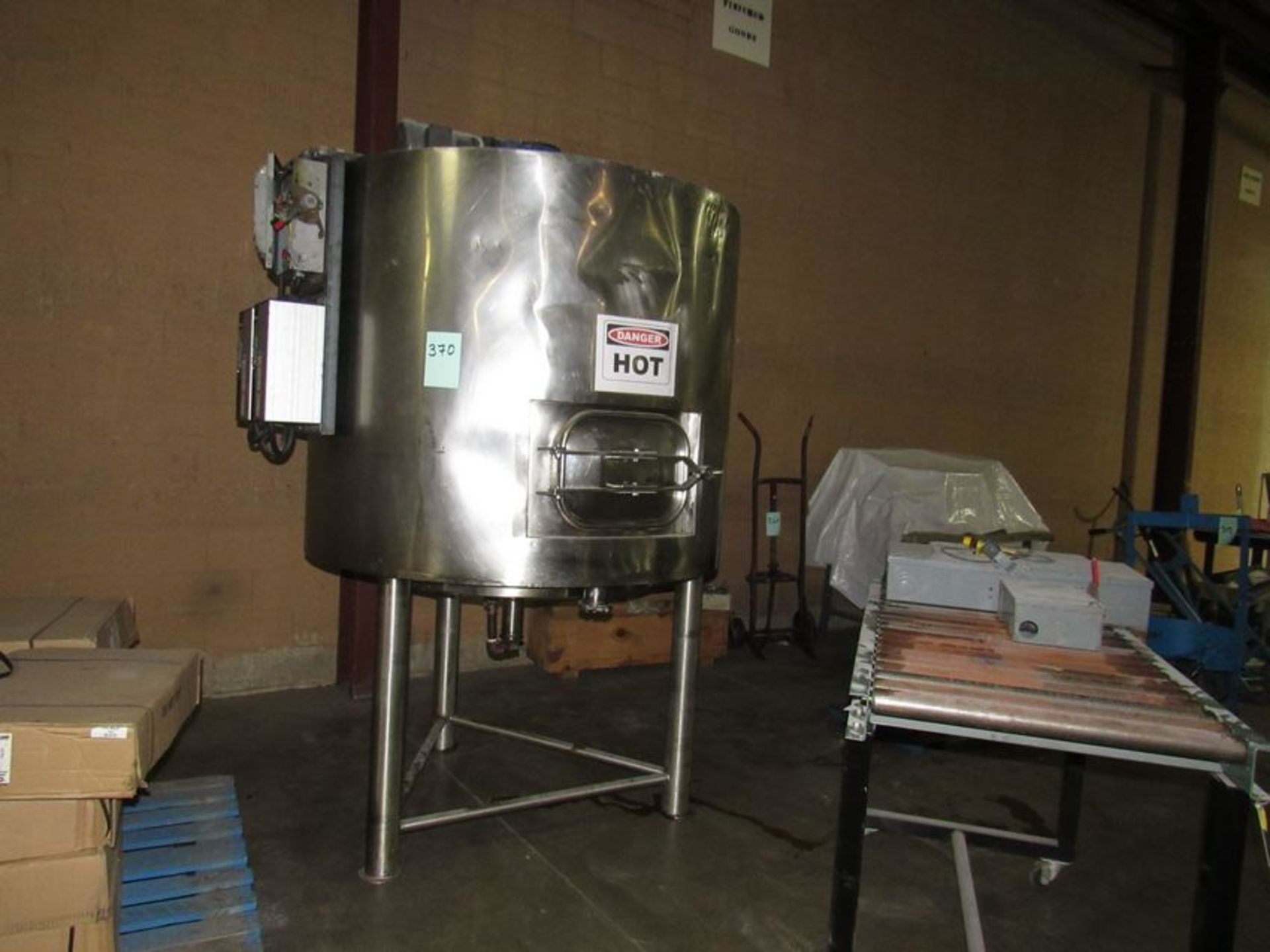 1500 liter food grade stainless steel jacketed tank in great condition. Inside approx. 4ft ft. dia