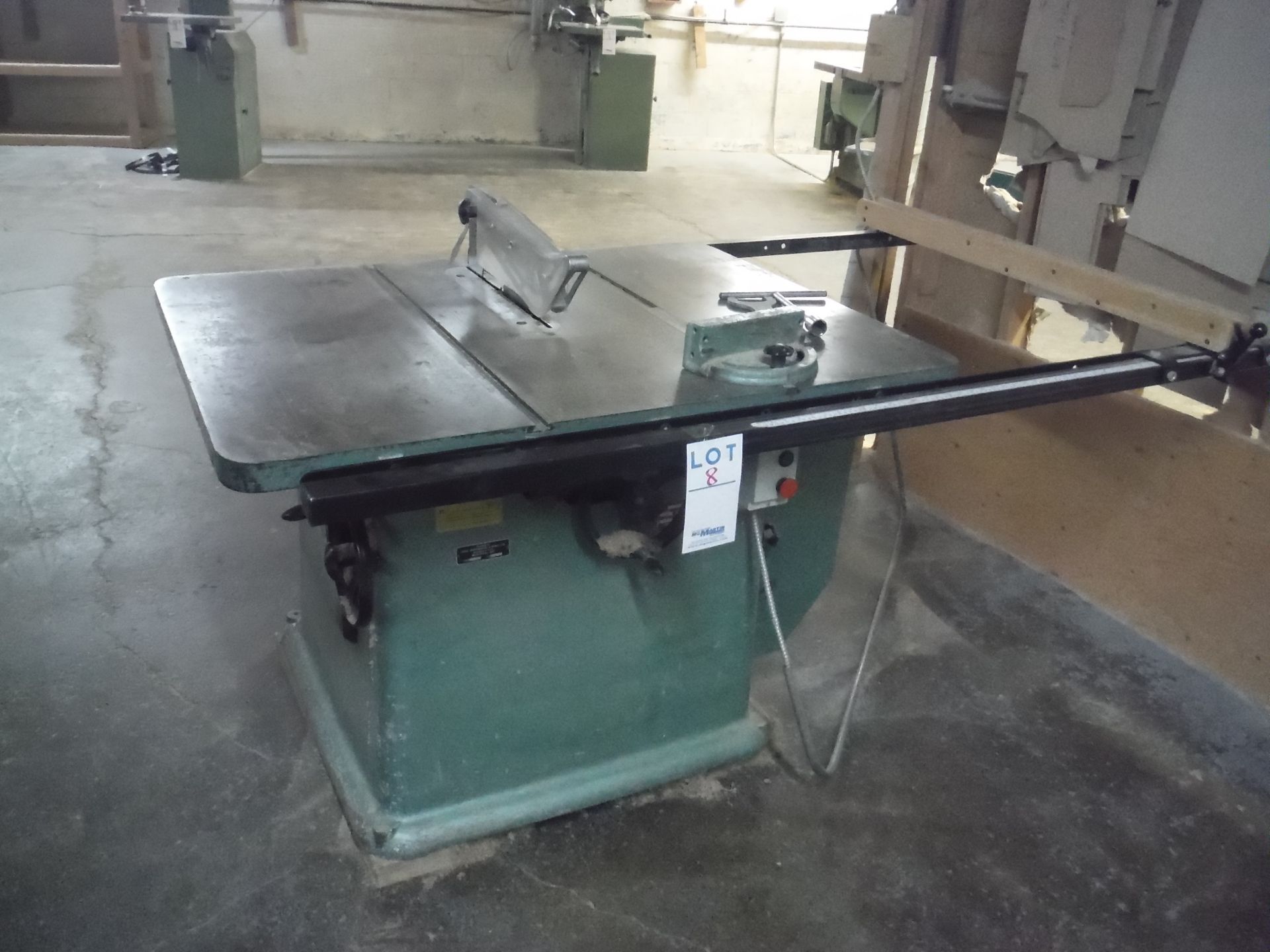 (1) ''POITRAS'' WOOD TABLE SAW MOD:4000 VOLTAGE : 575 HP:7.5 , 60 CYCLES