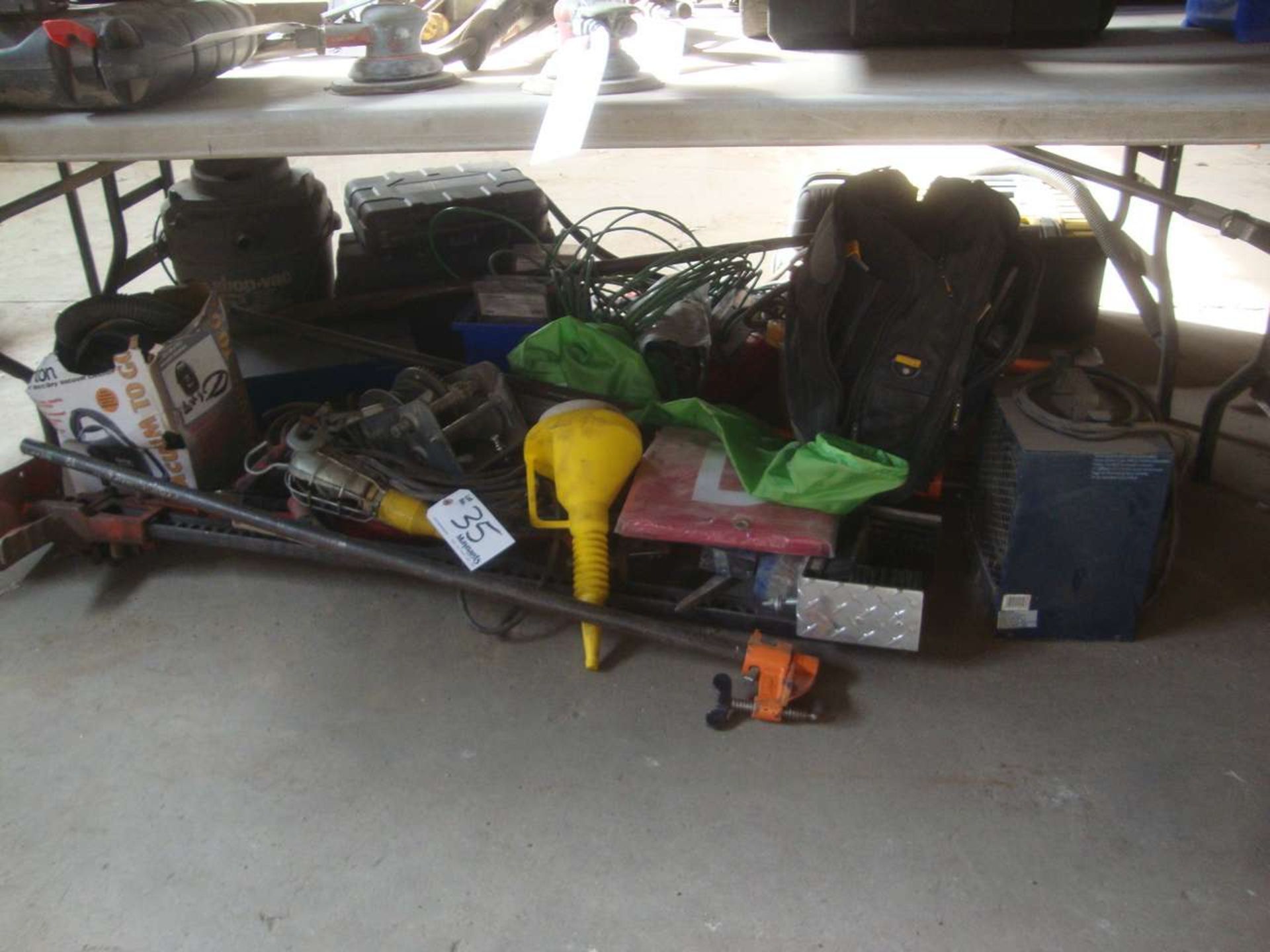 Lot of tools under table