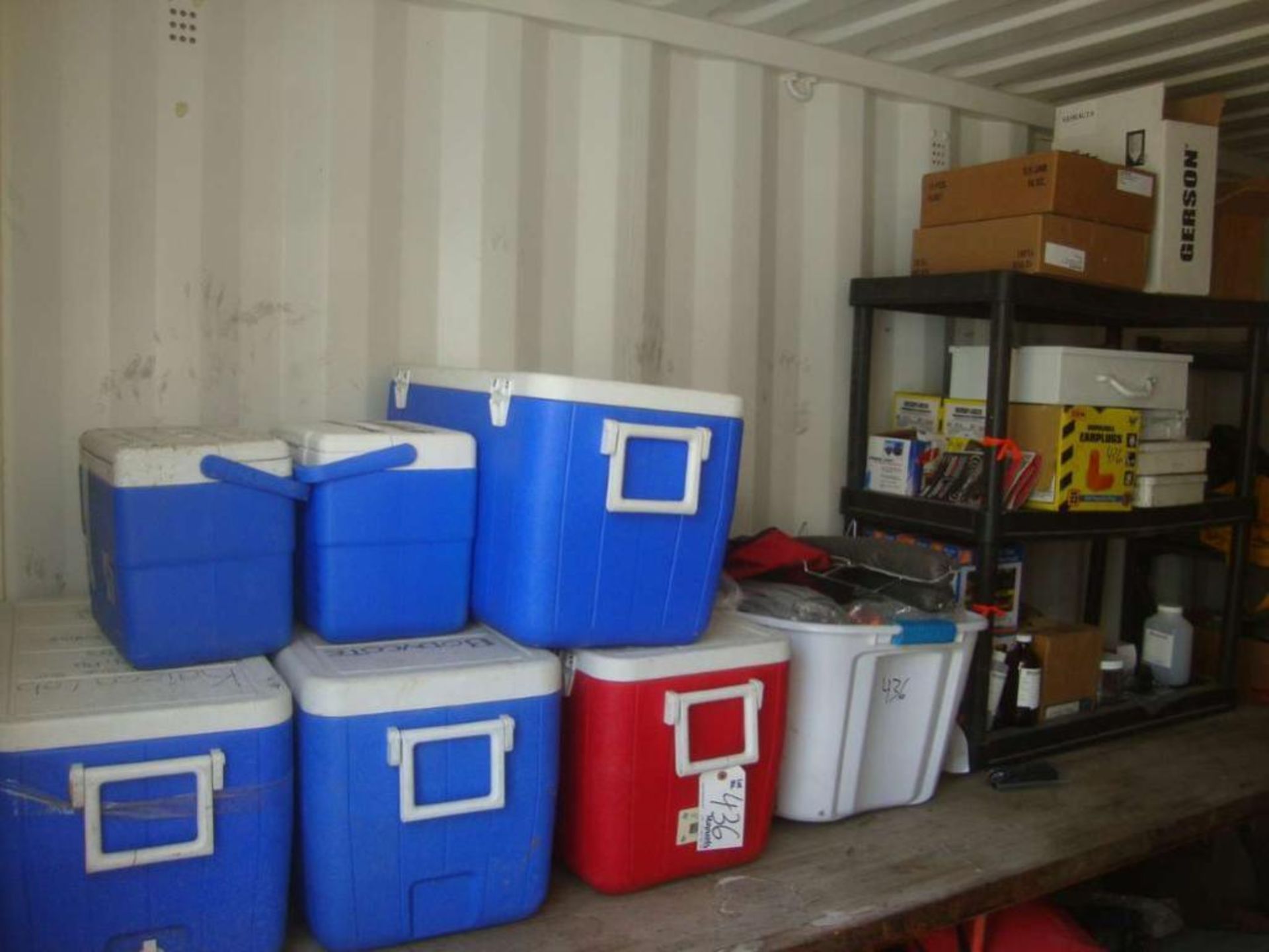 Lot of coolers and first aid kits