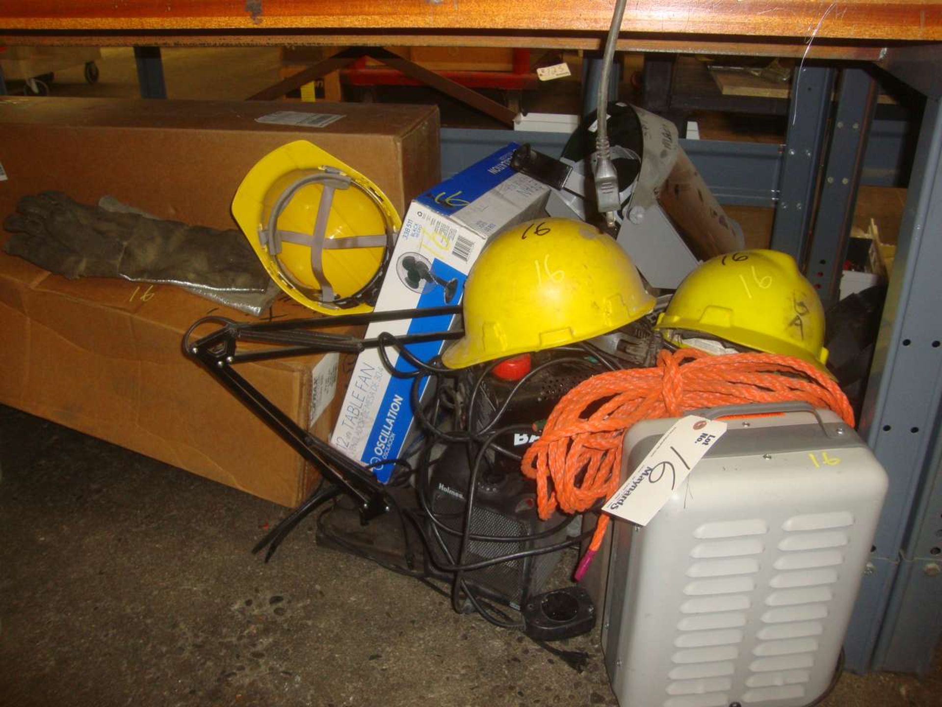 Lot of supplies under bench