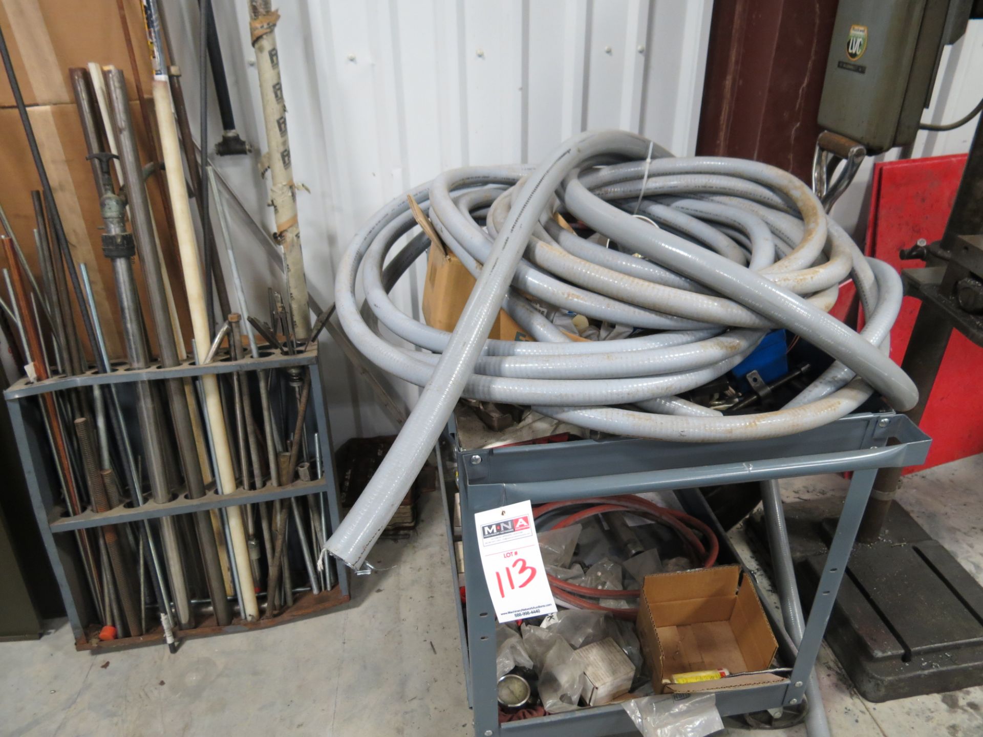 6 sections of shelving with misc maintenance items, wire, v-belts, etc.