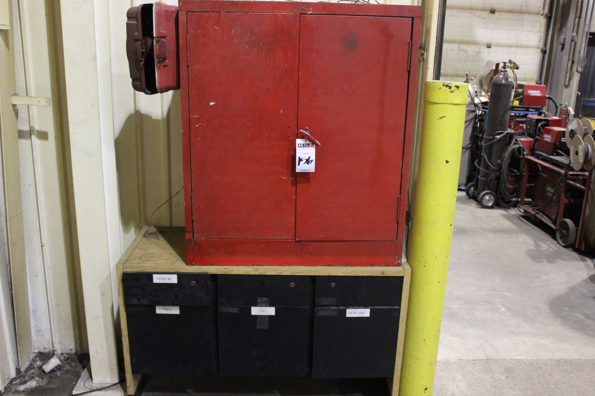 METAL CABINET AND WOOD DESK WITH ASSORTED WELDING SUPPLIES