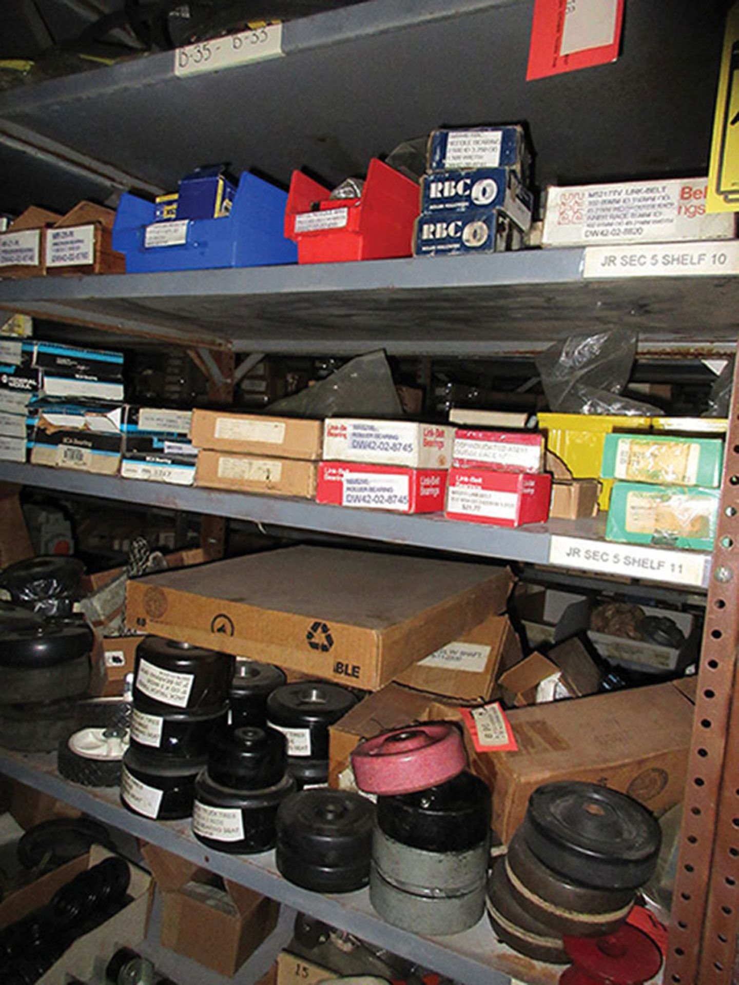 CONTENTS OF LOWER PART (1) SIDE, (4) SECTIONS OF SHELF UNIT: ASSORTMENT OF WHEELS & CASTERS;