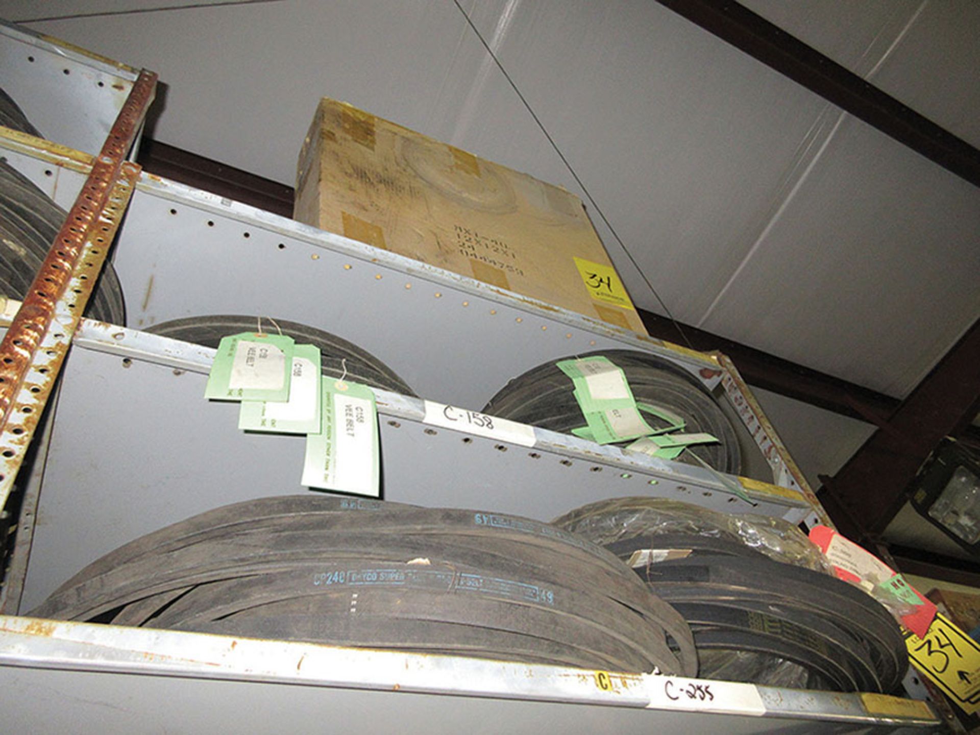 CONTENTS OF TOP PART OF ENTIRE SHELF UNIT: PYLONS, VARIOUS BELTS, HOSES, 3'' X 132'', 4'' X 36'', - Image 8 of 8