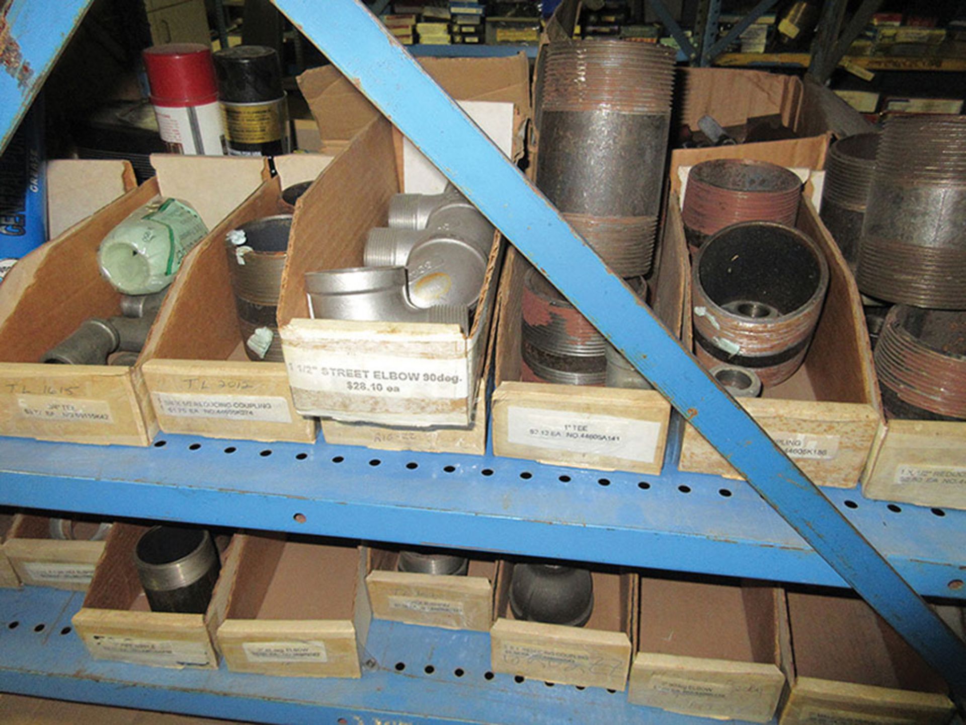 CONTENTS ON LOWER SECTION OF SHELF UNIT: DIE SPRINGS, GATE VALVES, COUPLINGS, UNIONS, AND TEES *** - Image 7 of 8