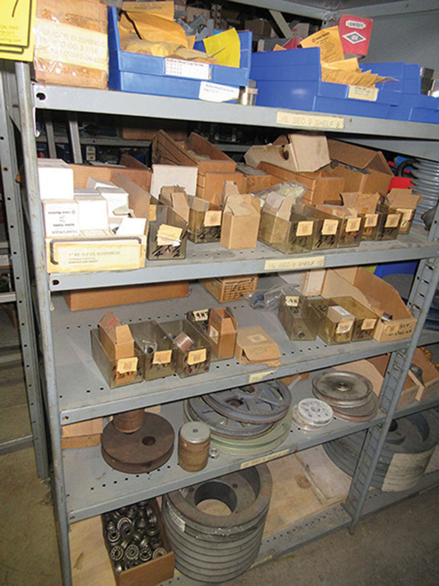 CONTENTS OF (1) SIDE, (5) SECTIONS OF SHELF UNIT: ASSORTMENT OF PULLEYS; SHEAVES; BUSHINGS; SQUARE D