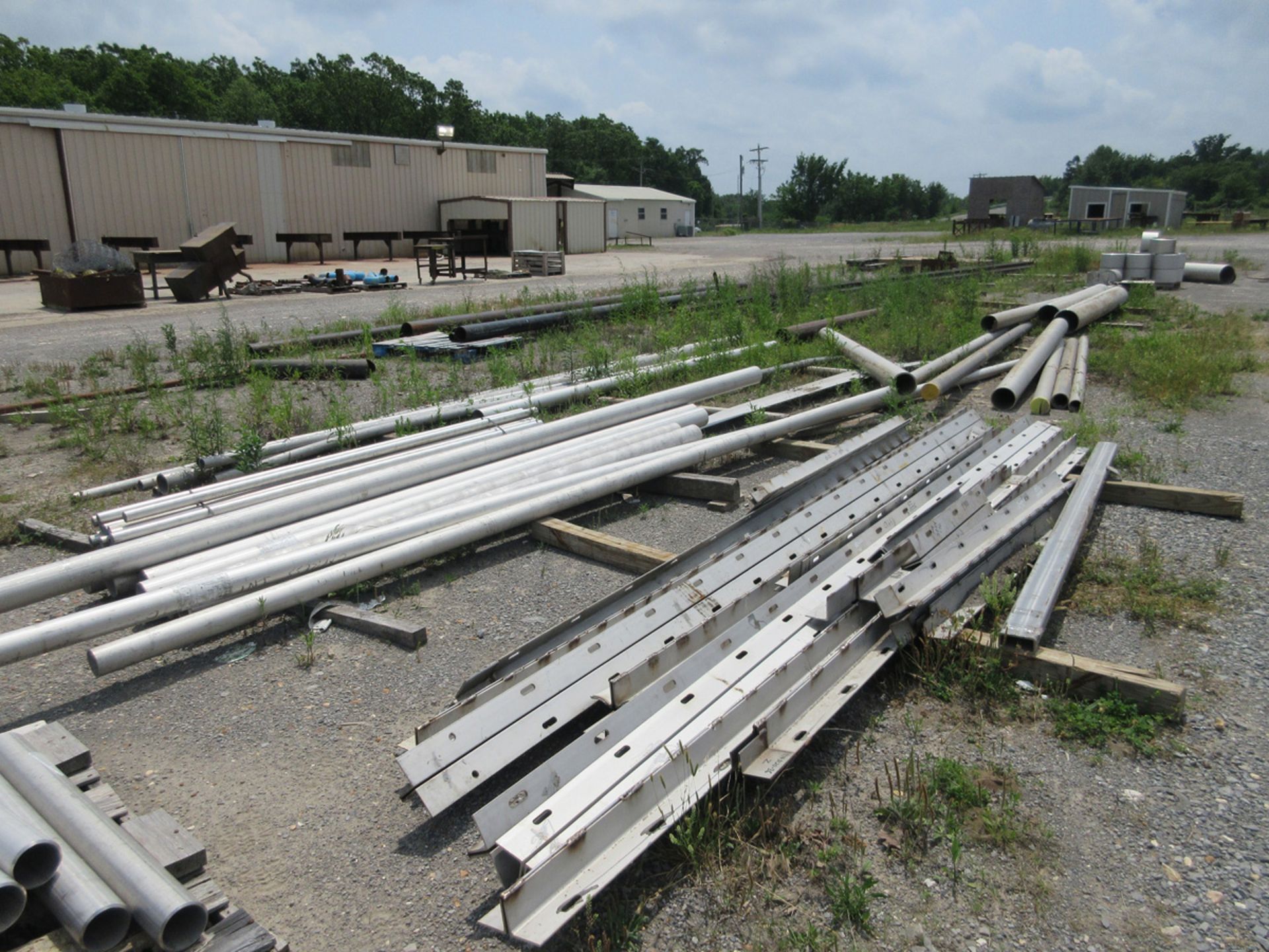 LARGE ASSORTMENT OF STEEL PIPE, W.I.P., AND ANGLE STOCK