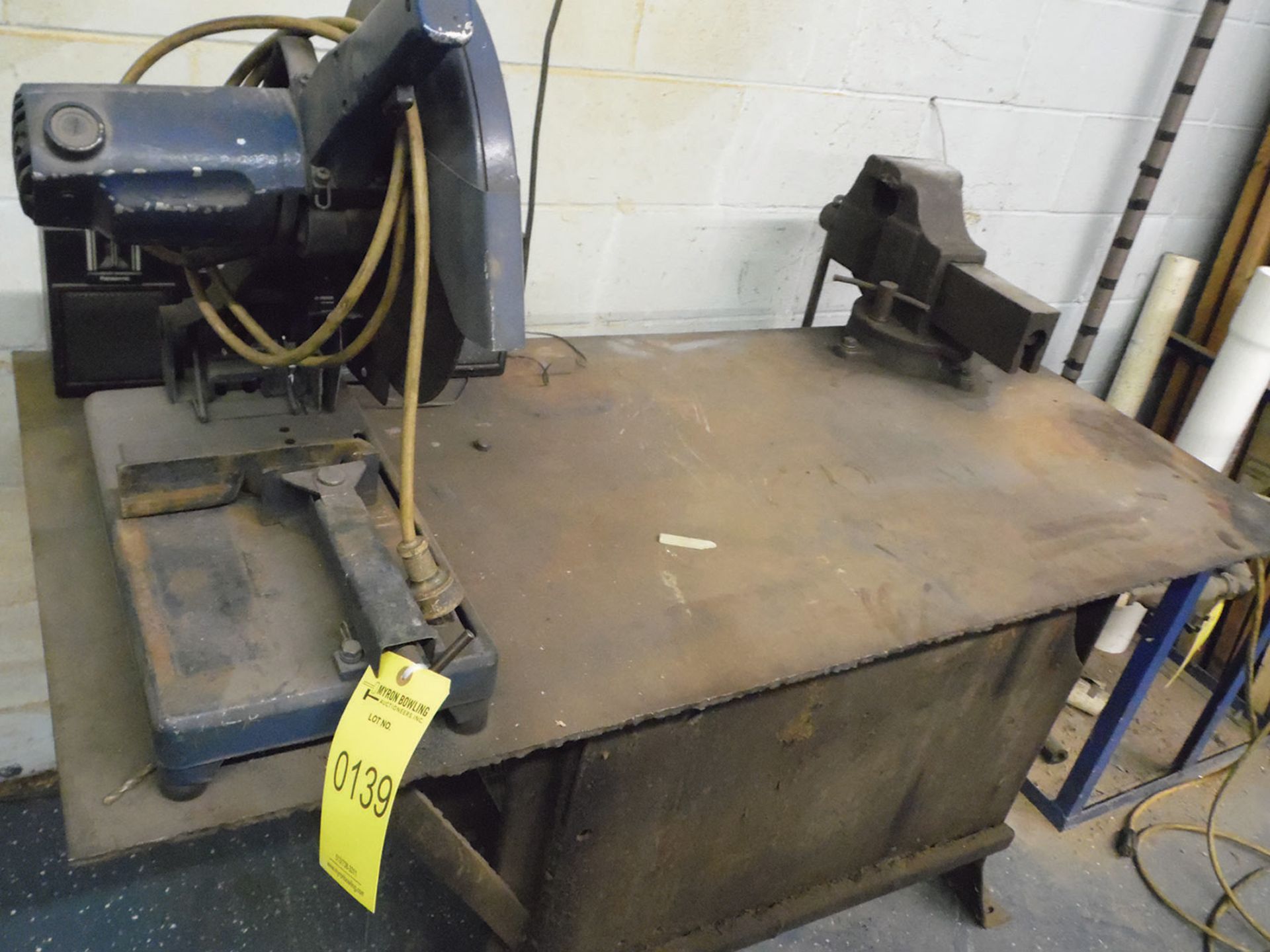 STEEL TABLE 28'' X 58'', HITACHI 12'' ABRASIVE CHOP SAW, AND 5'' BENCH VISE
