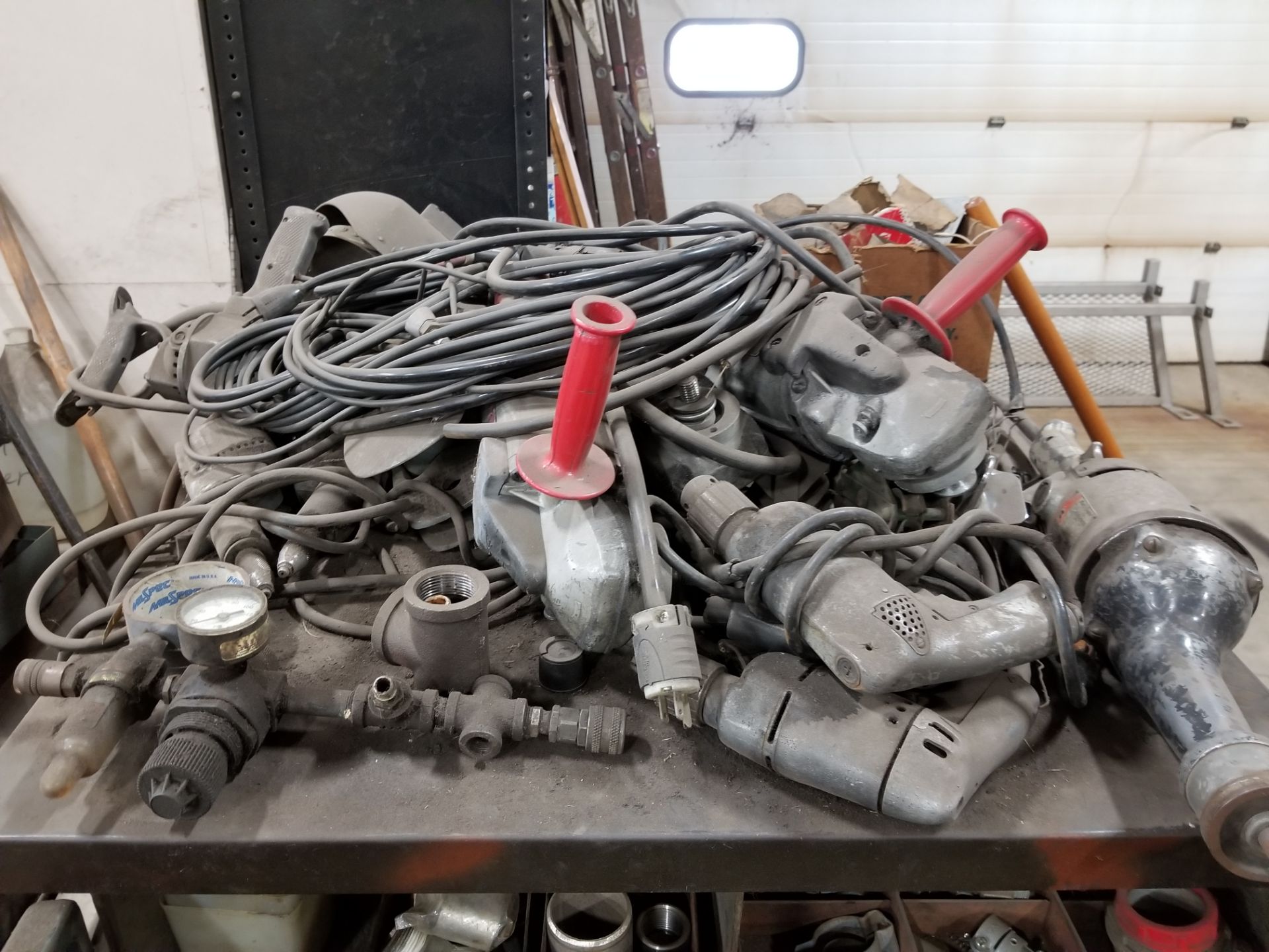 PALLET OF ELECTRIC GRINDERS, ELECTRIC SCREW GUNS, ELECTRIC SAWS, AND DRILLS (ALL IN NEED OF REPAIR)