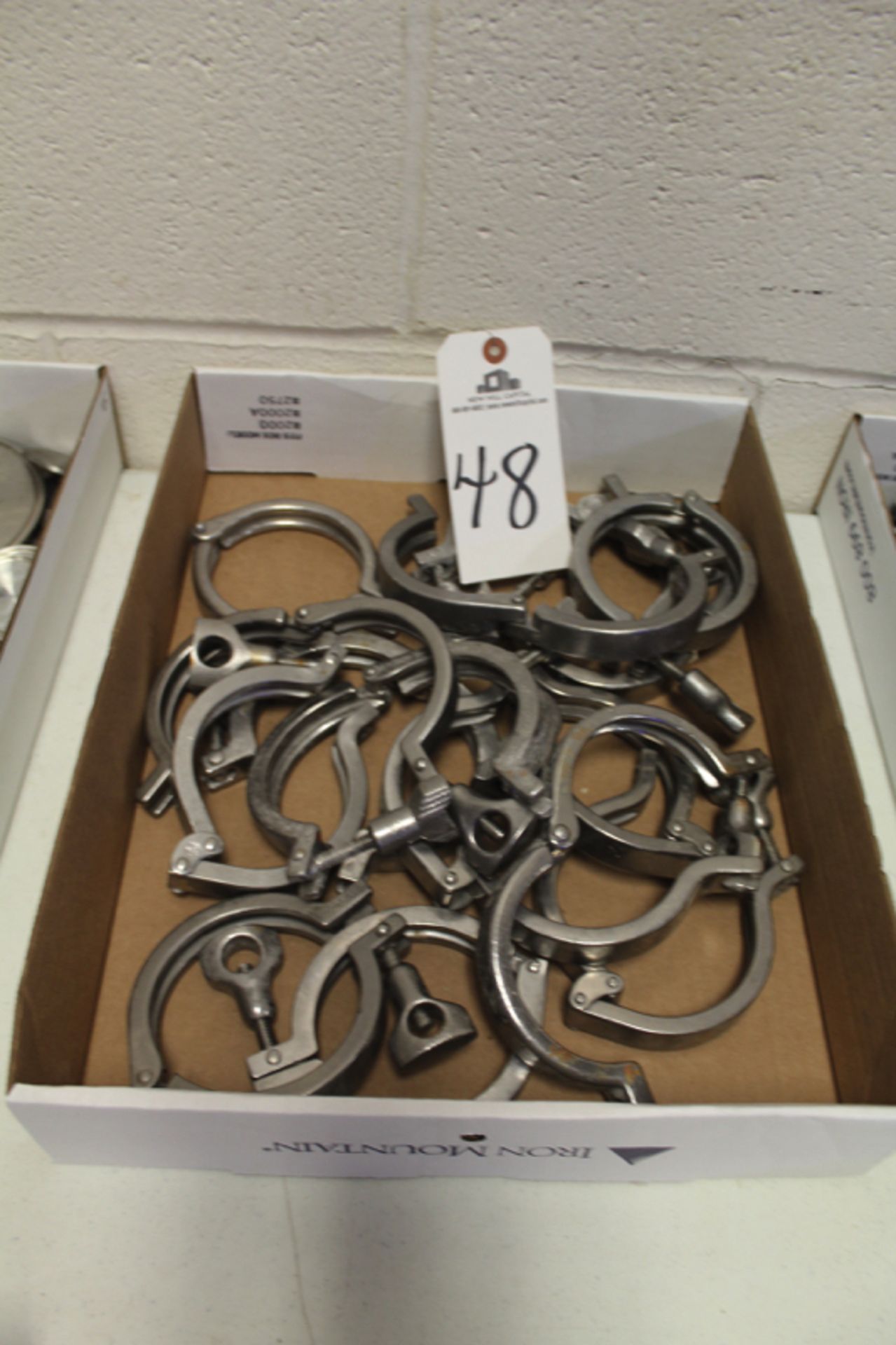 Lot of (15) Sanitary Pipe Clamps; Location: Oven/Mixing Room --- Rigging Price: Buyer May Hand Carry