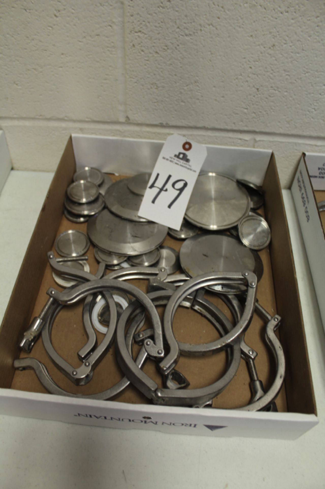 Lot of Sanitary Pipe Clamps & Fittings | Location: Oven/Mixing Room | Rigging Price: Buyer May