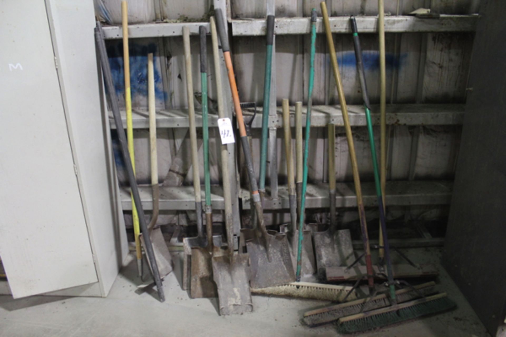 Lot of Brooms & Shovels | Location: Maintenance Building