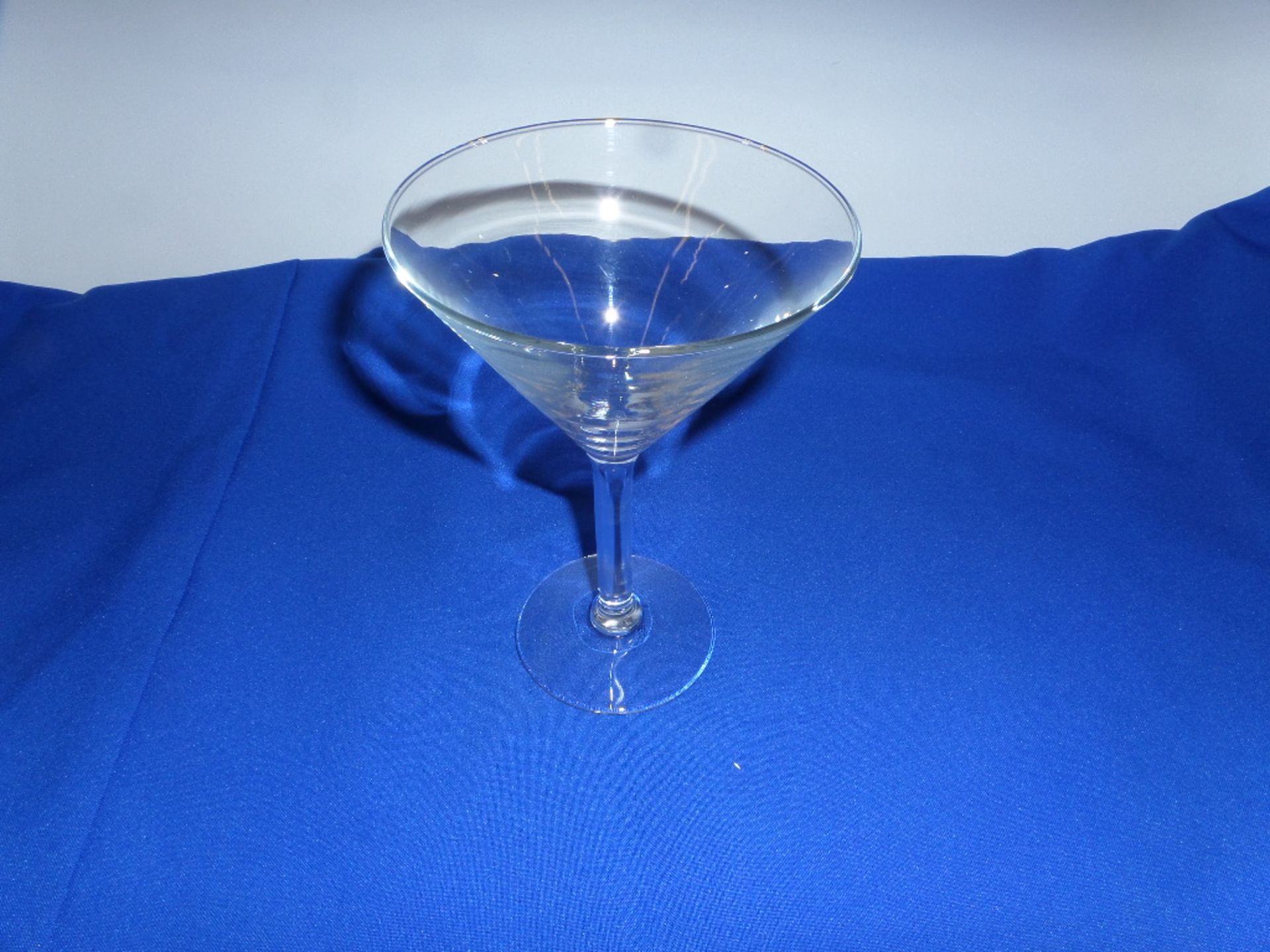 (74) Martini Glasses in 9 Plastic Glass Racks