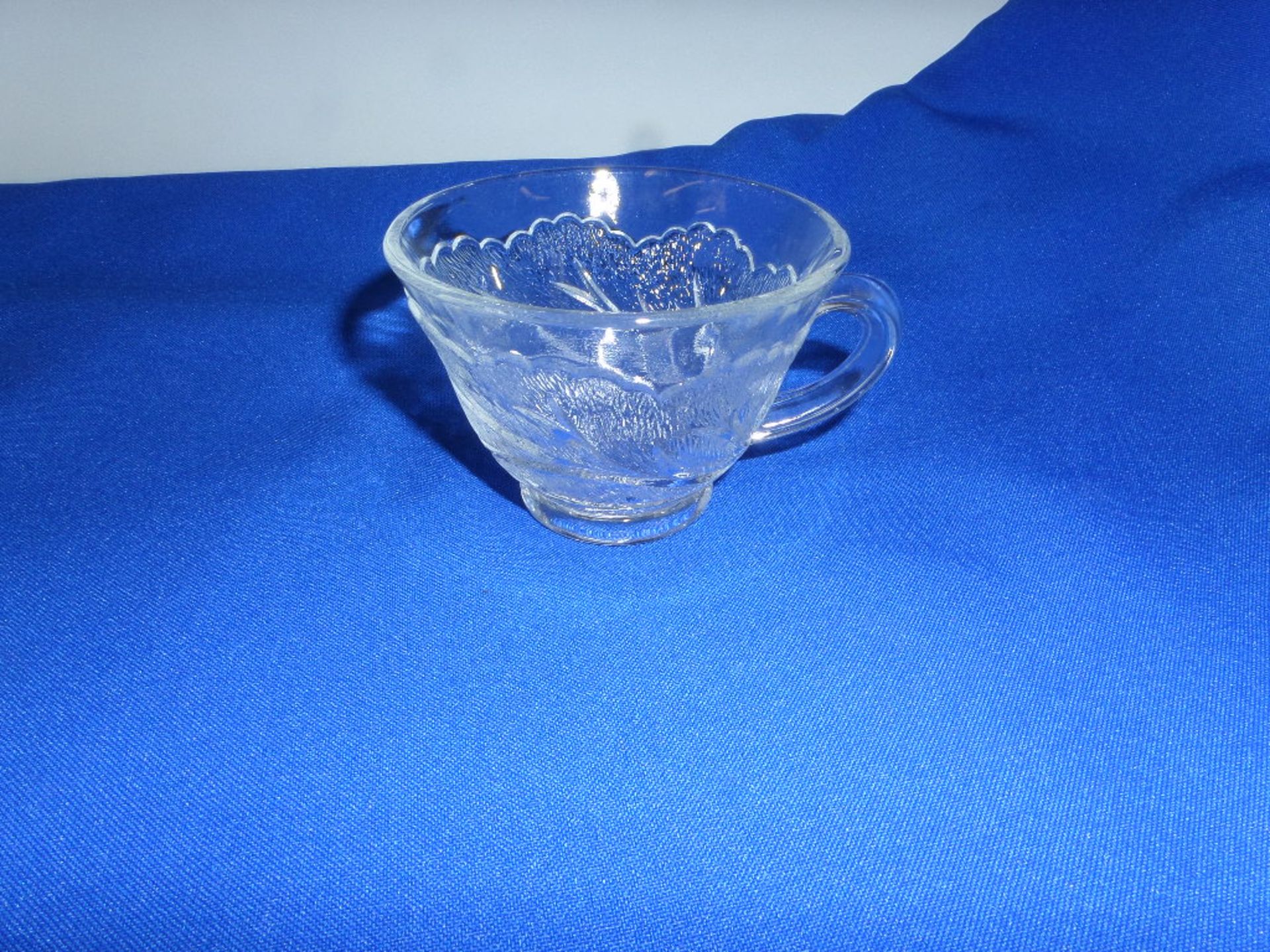 (34) Glass Punch Cups in 2 Plastic Glass Racks