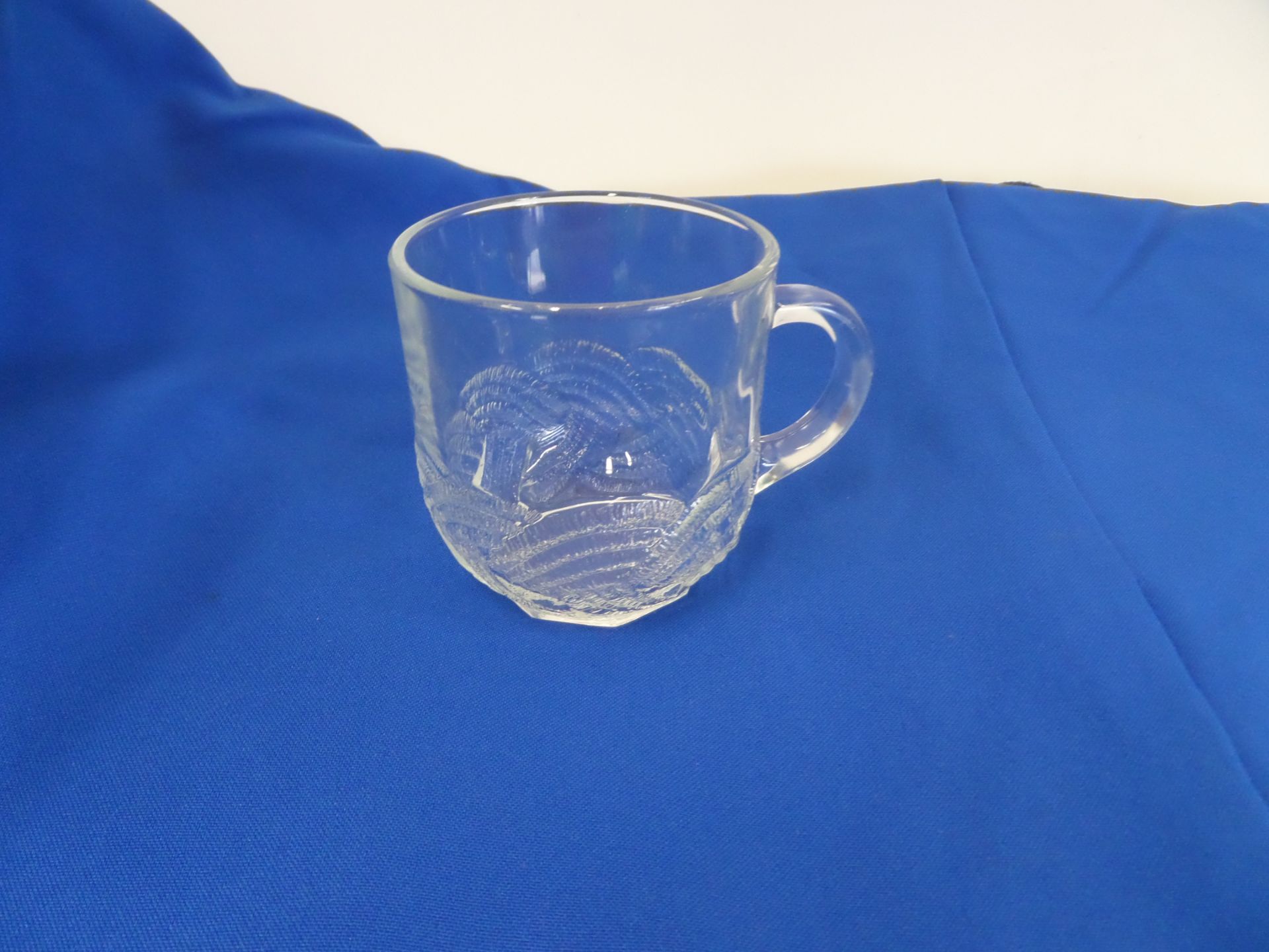 (184) Glass Punch Cups in 9 Plastic Glass Racks